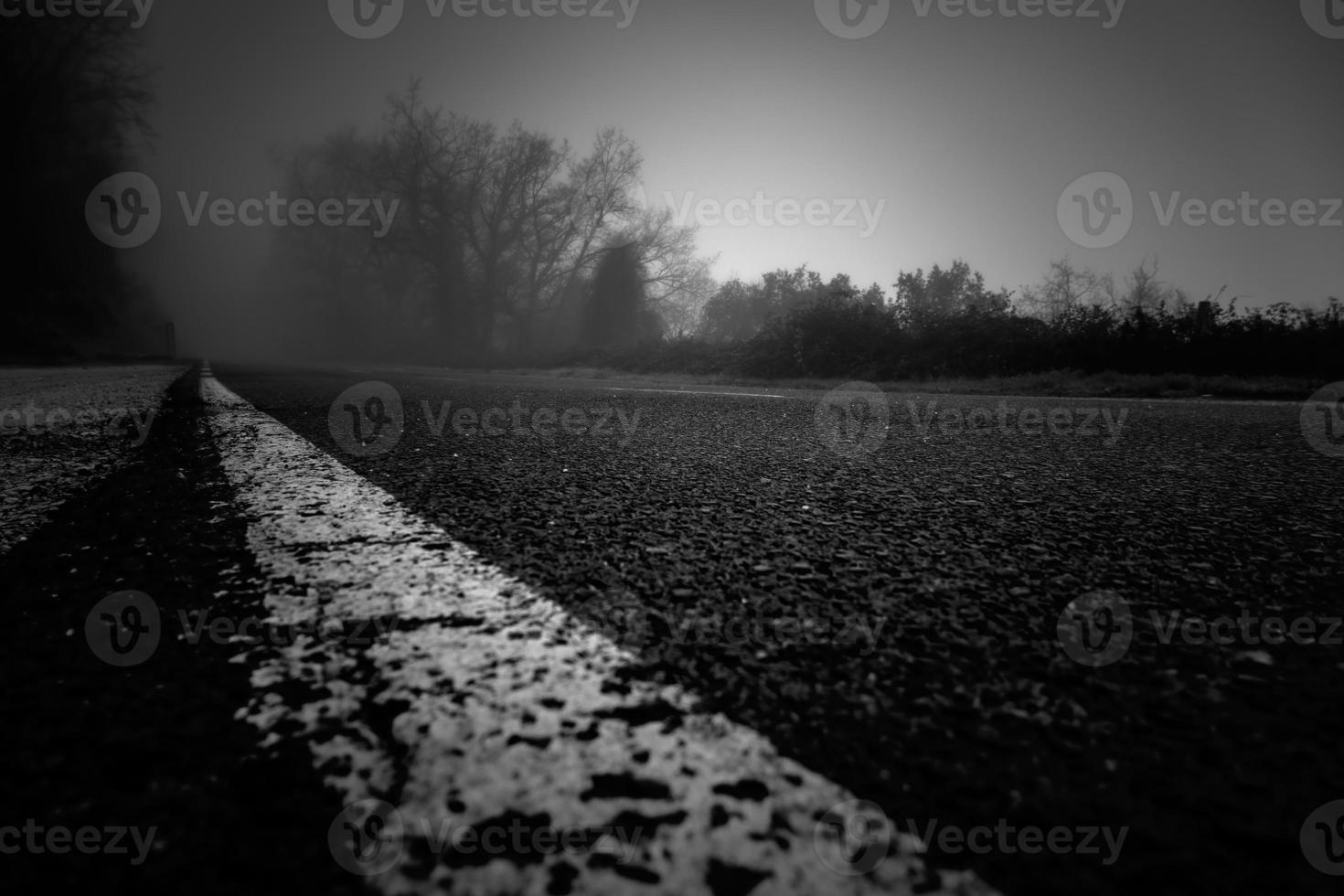 Asphalt lines with snow photo