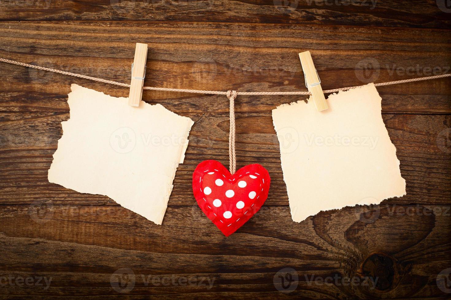 Valentines Vintage Handmade Hearts over Wooden Background. photo