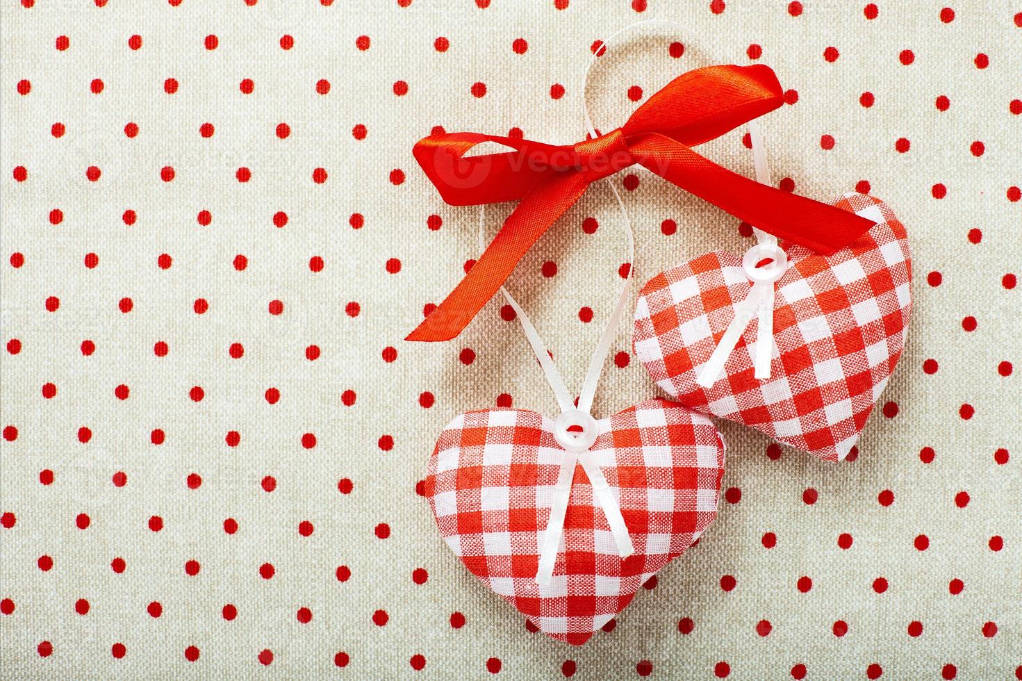 Heart made of cloth in red cell handmade Valentines Day photo