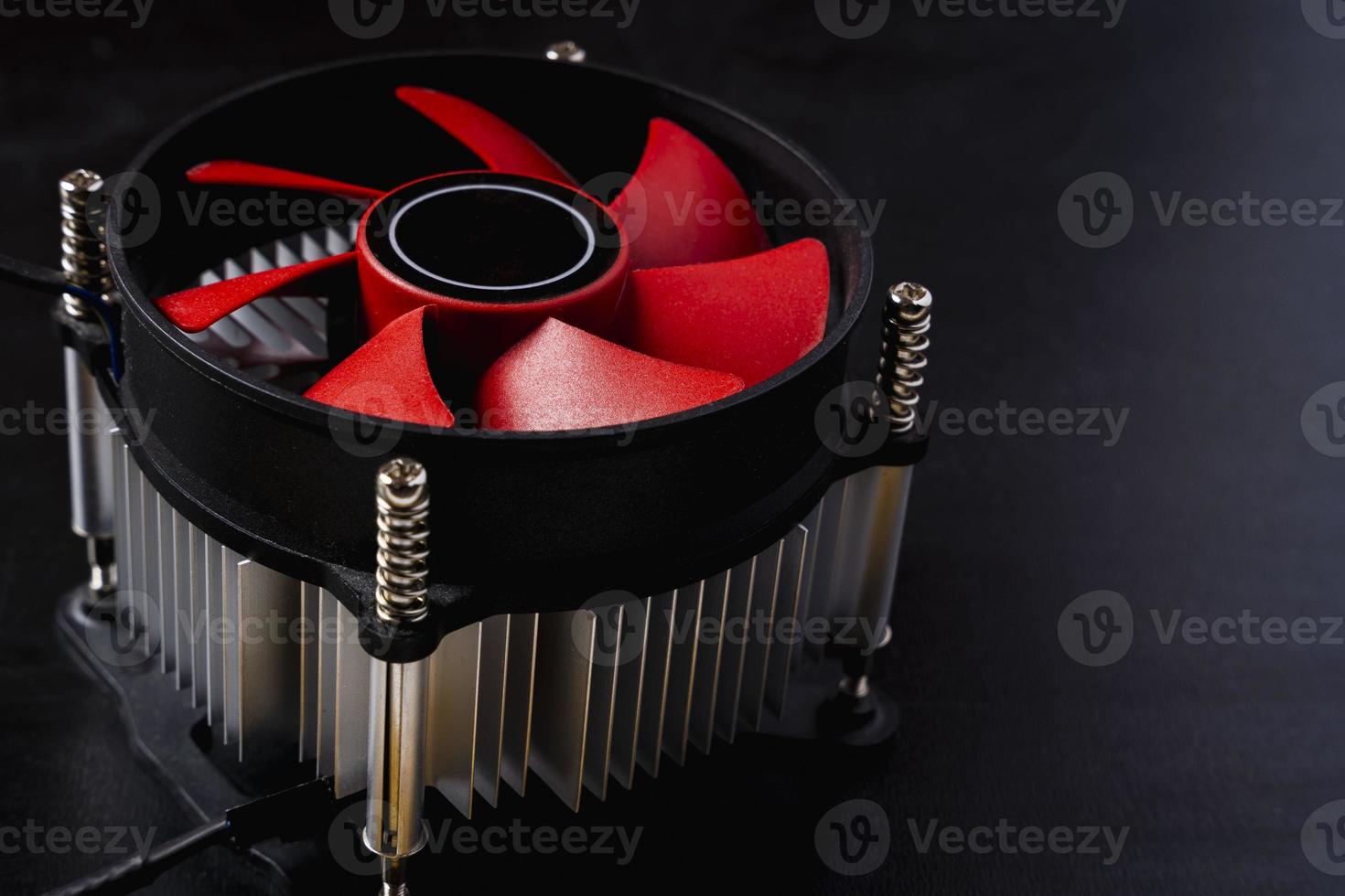 Computer cooler, close-up of a computer processor cooler on a black background photo
