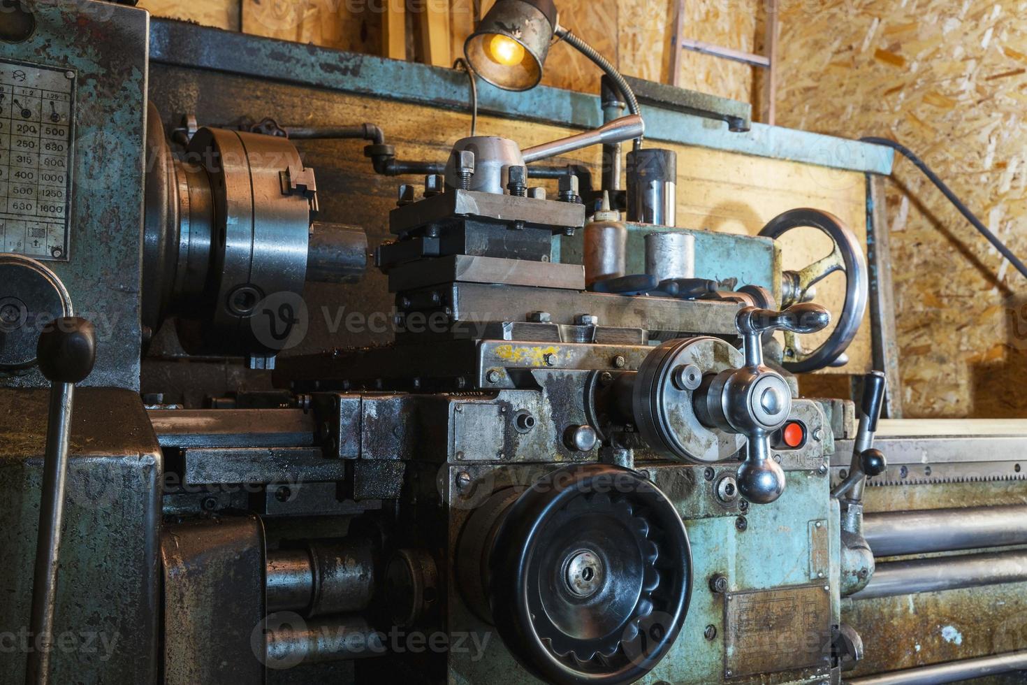 Old metal lathe in the metalworking, machine tools 18789160