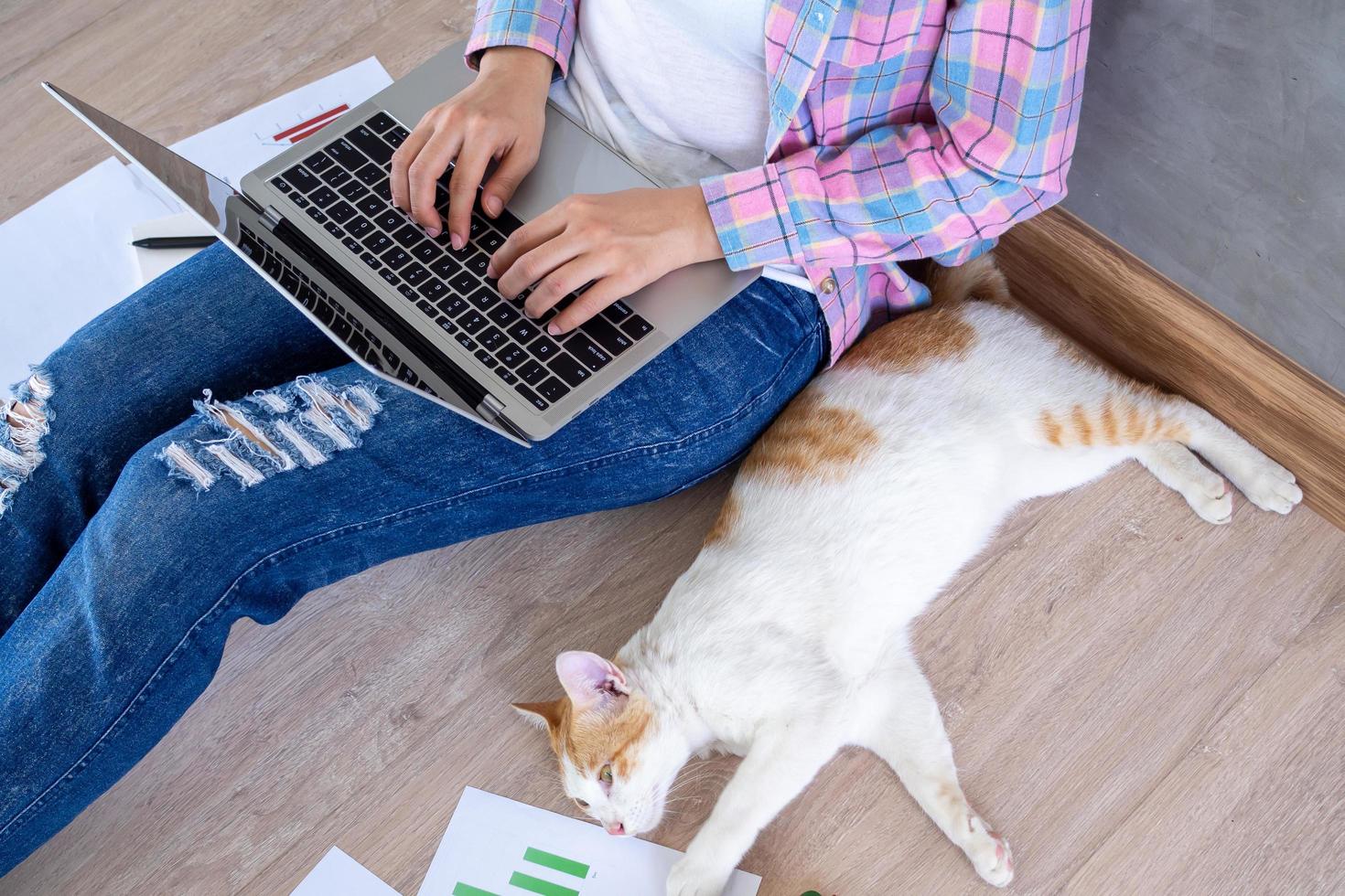 Female students study online with video calls on their laptops at home. study from home Keep social spacing to prevent the spread of the Covid-19 virus. photo
