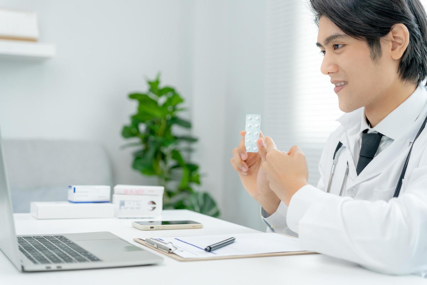 tele-medical. Doctor explains the medication to the patient by video conference. Asian doctor is treating patients through telecommunication while describing the disease . Technology for health. photo