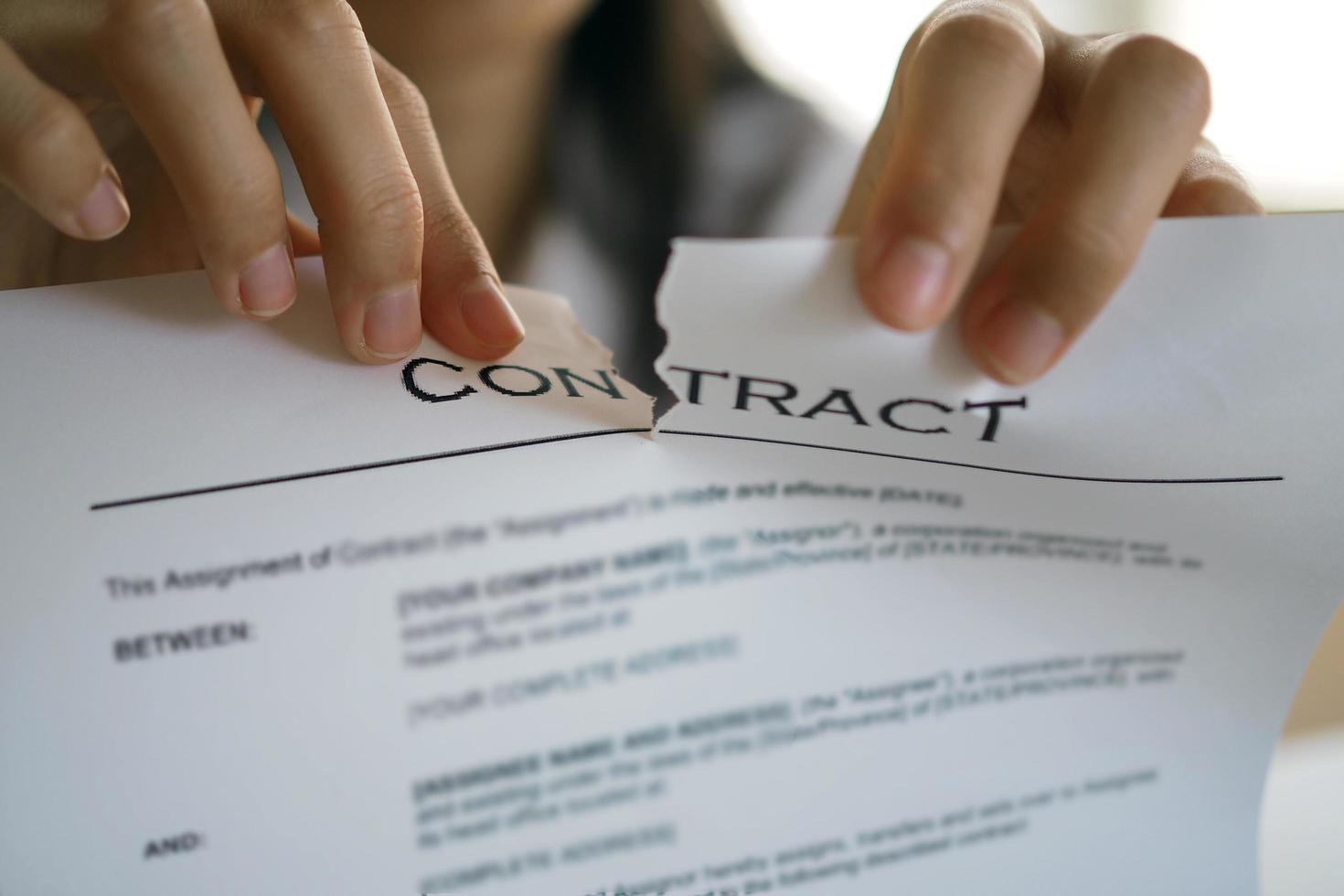 Businessmen are tearing documents, contracts or agreements that have direct legal consequences. Cancel the contract and justice photo