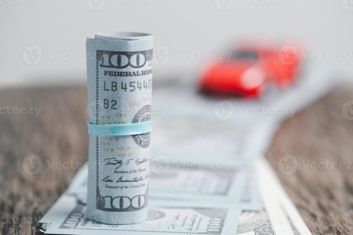 Concept of car insurance business, saving buy - sale with tax and loan for new car. Car toy vehicle with stack coin money on background. Planning to manage transportation finance costs. loan for car photo