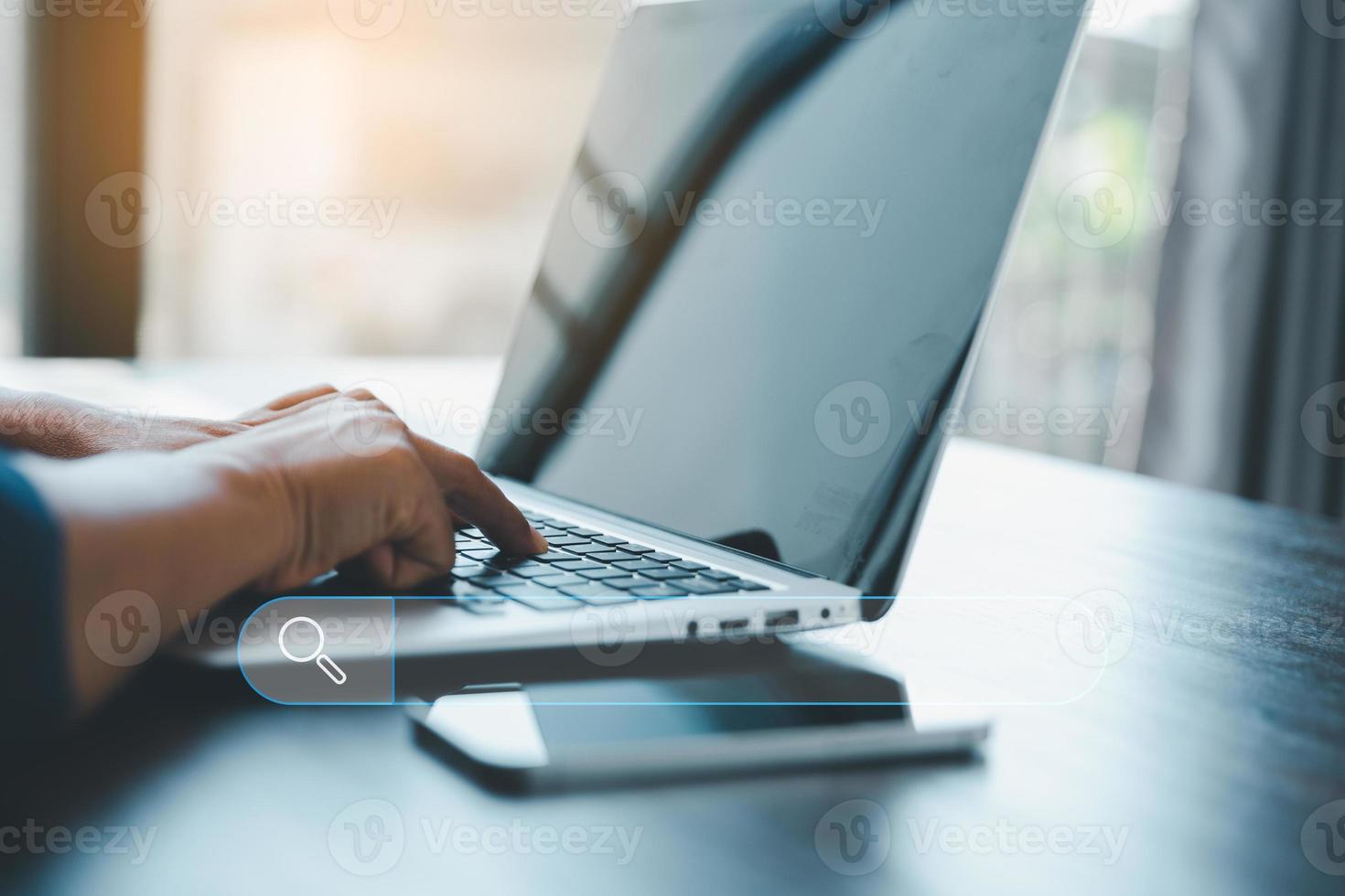Search Engine Optimization SEO, data searching technology. business hands typing on laptop computer keyboard to search the information via internet web browser. Browsing social networking interface. photo