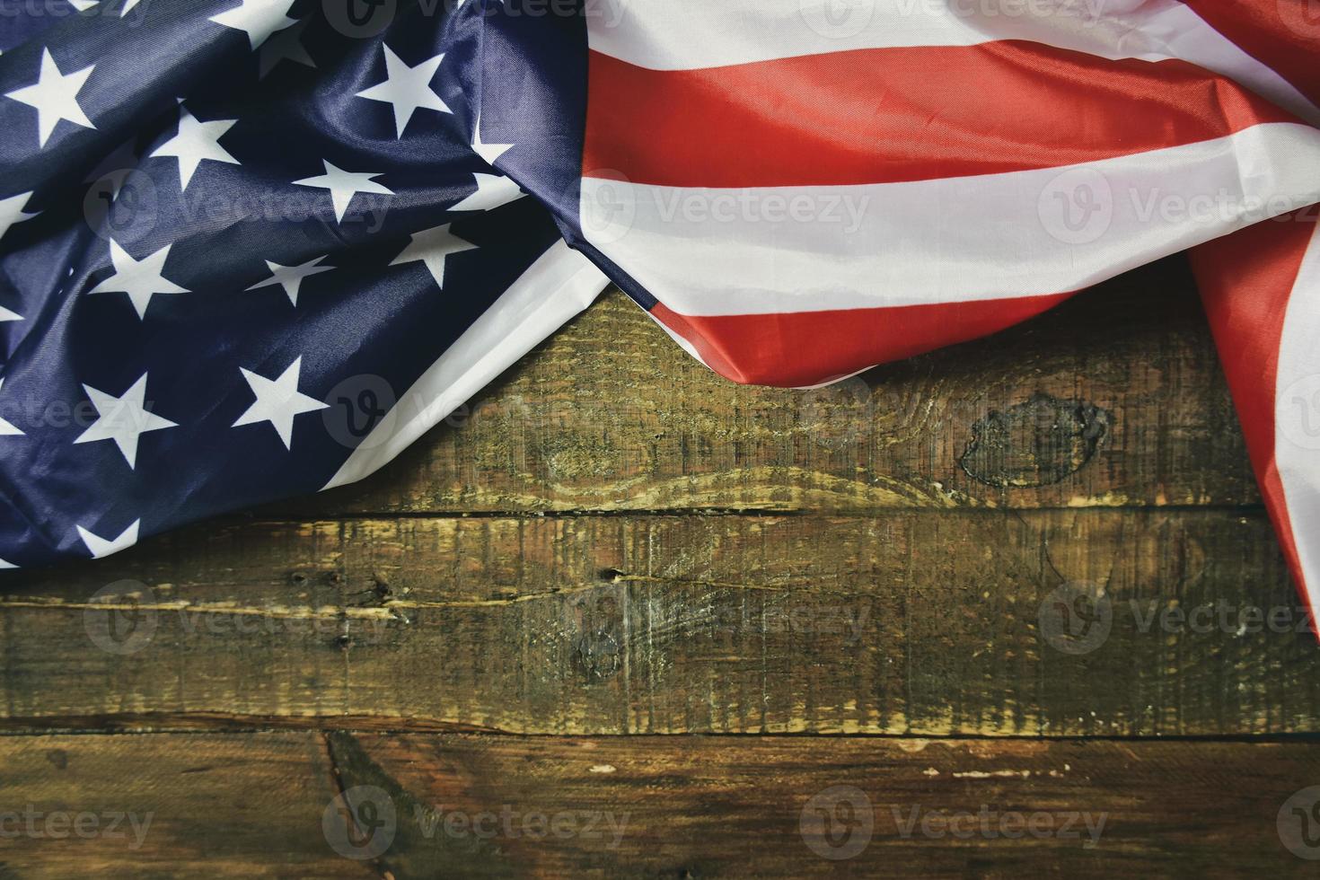 American Flag on wooden background photo