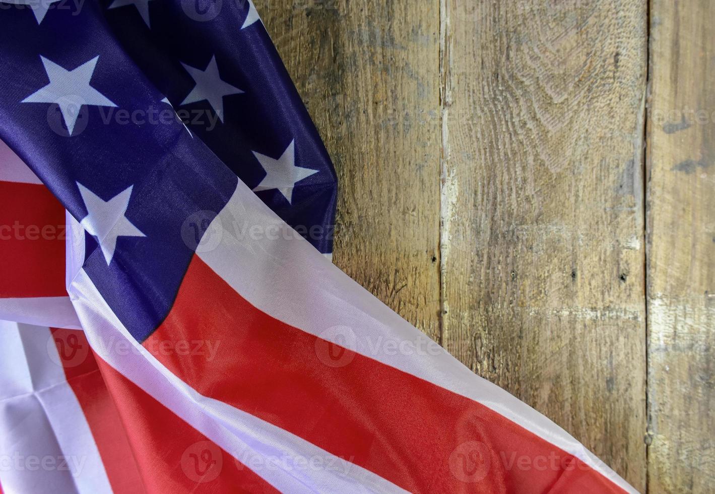 American Flag on wooden background photo