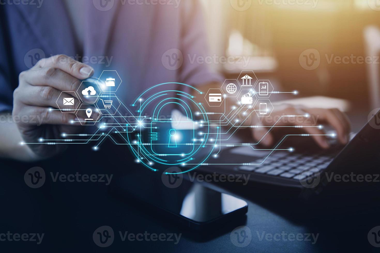Cybersecurity and privacy concepts to protect data. Lock icon and internet network security technology. Businessman protecting personal data on smart phone with virtual screen interfaces. photo