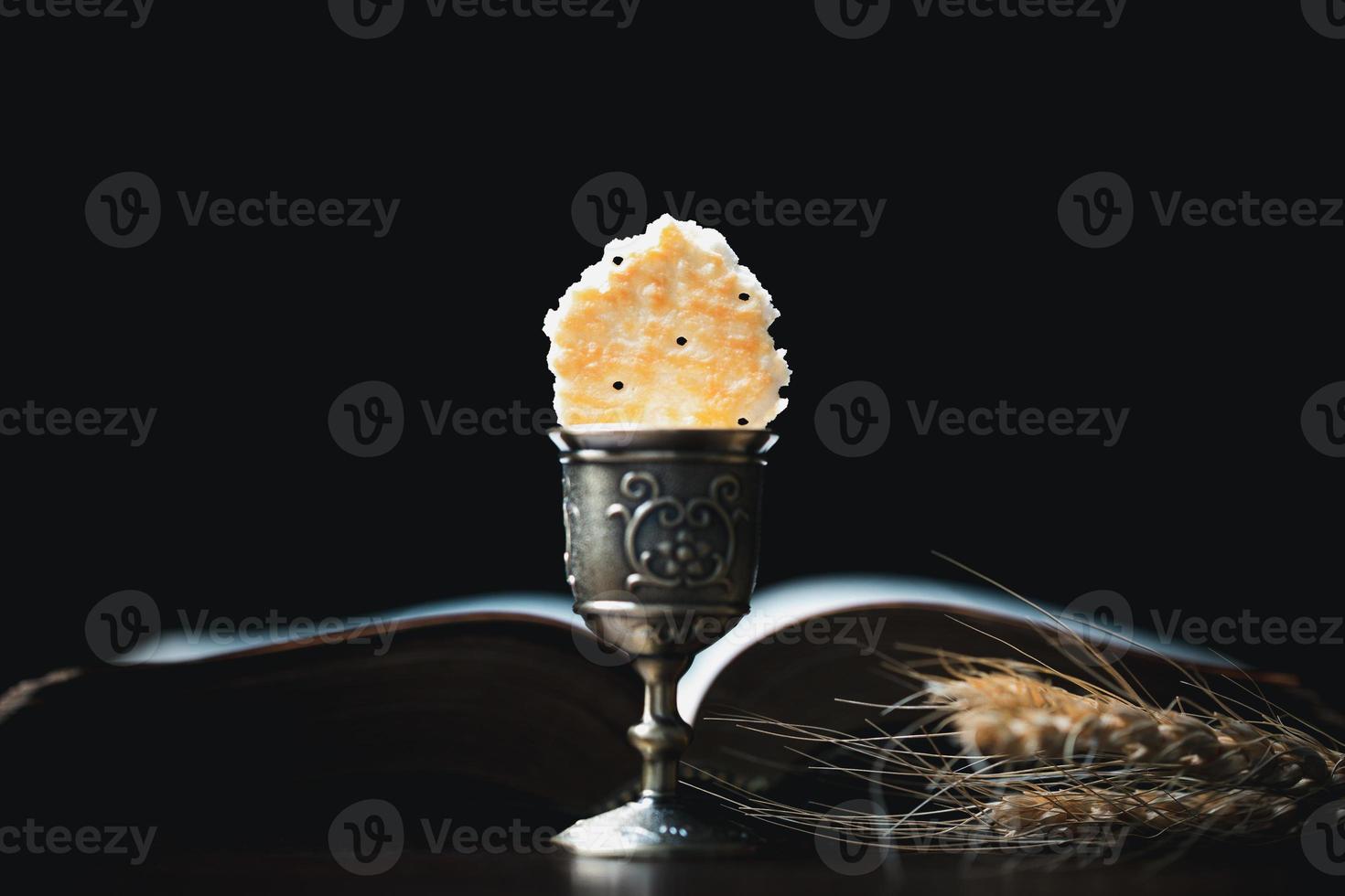 Concept of Eucharist or holy communion of Christianity. Eucharist is sacrament instituted by Jesus. during last supper with disciples. Bread and wine is body and blood of Jesus Christ of Christians. photo