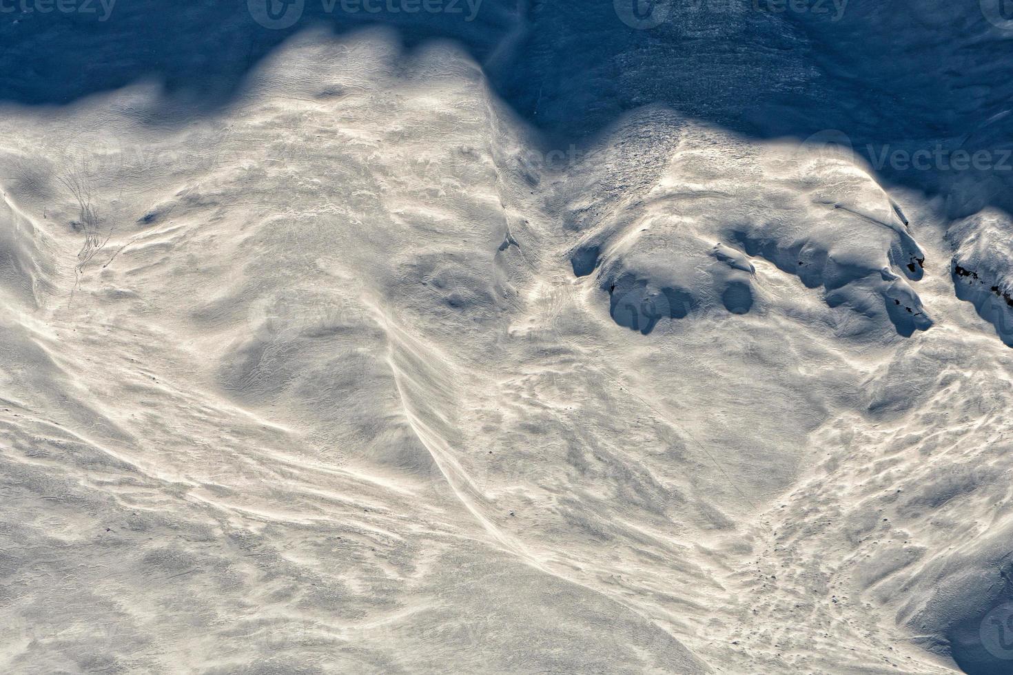 Avalanche snow slide in dolomites mountains photo