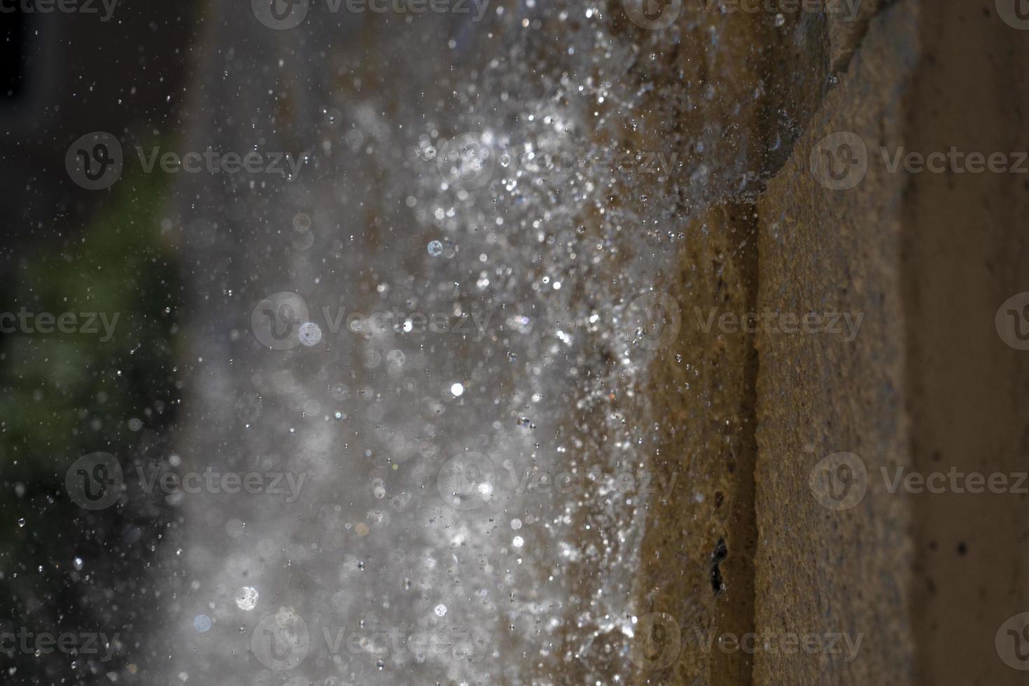 fountain splash on a wall detail photo