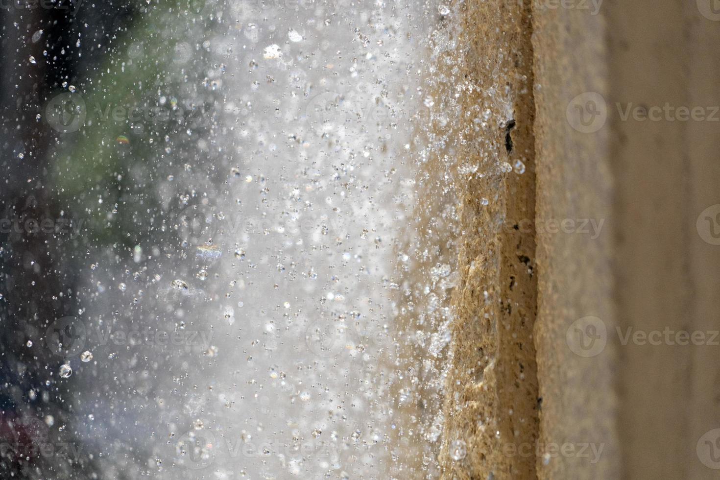 fountain splash on a wall detail photo