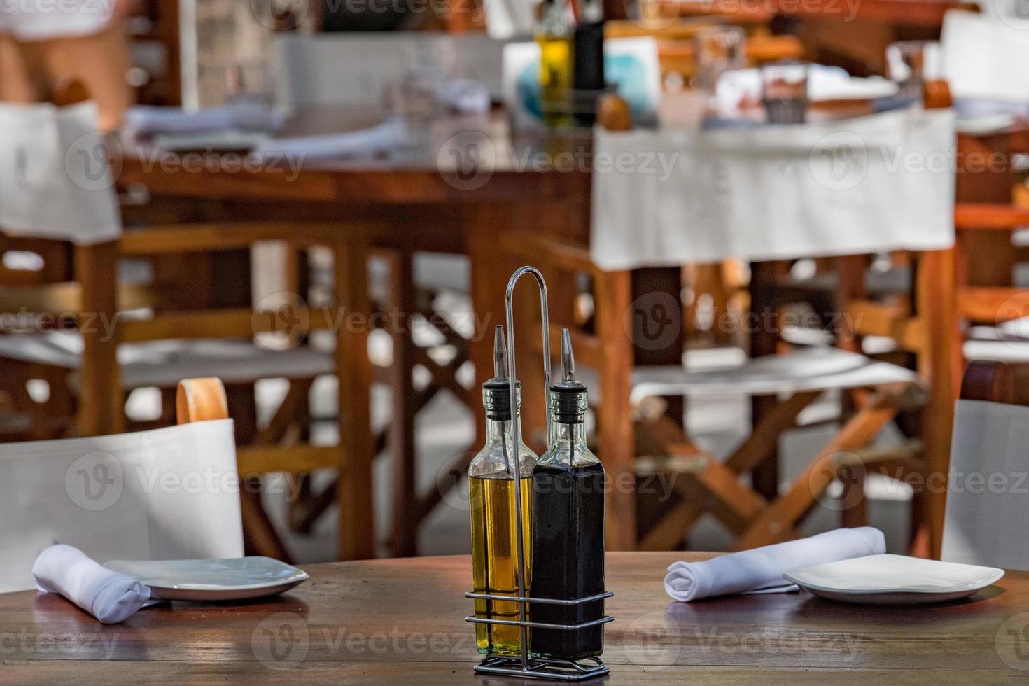 oil and vinegar on a table photo