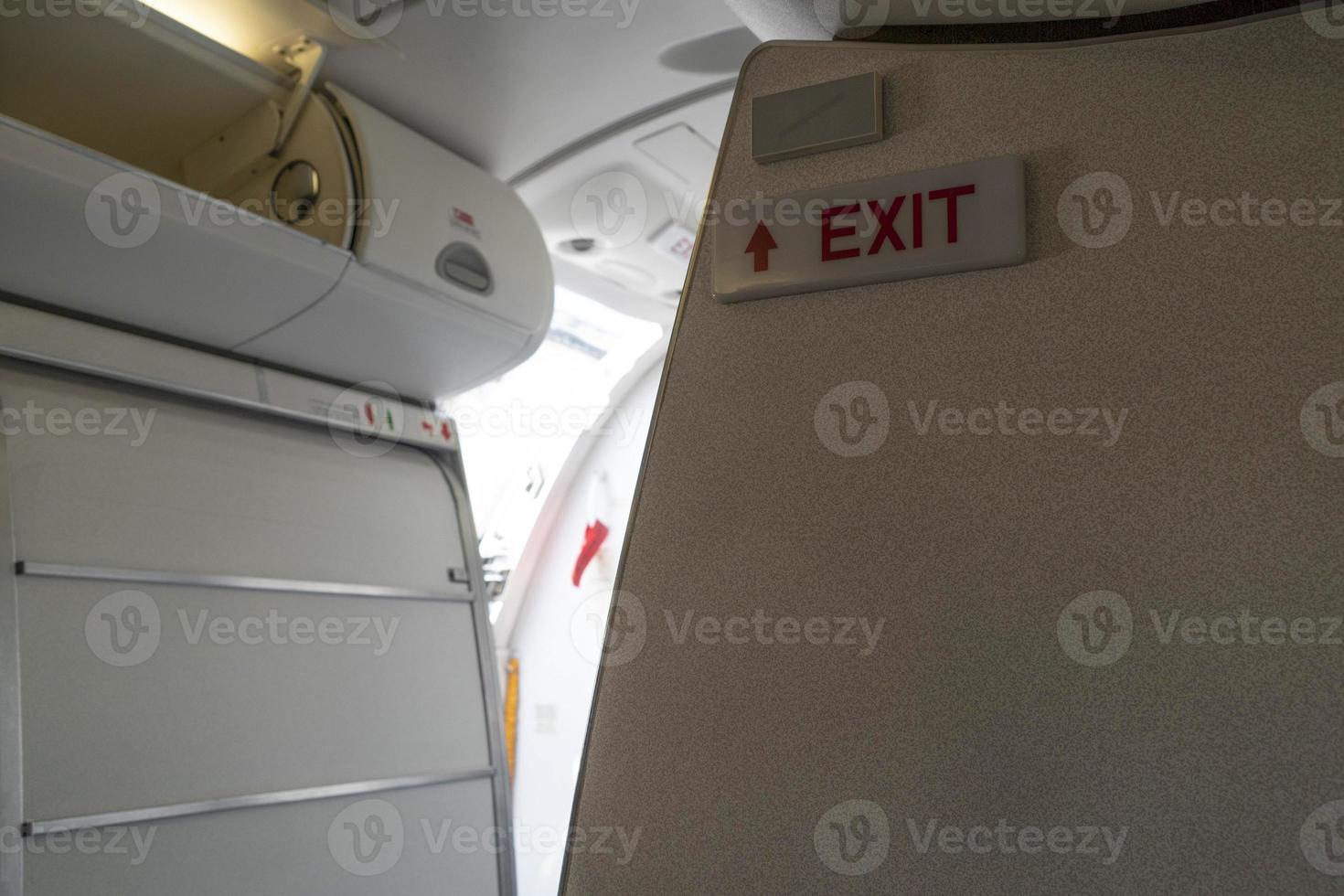 exit sign on airplane photo