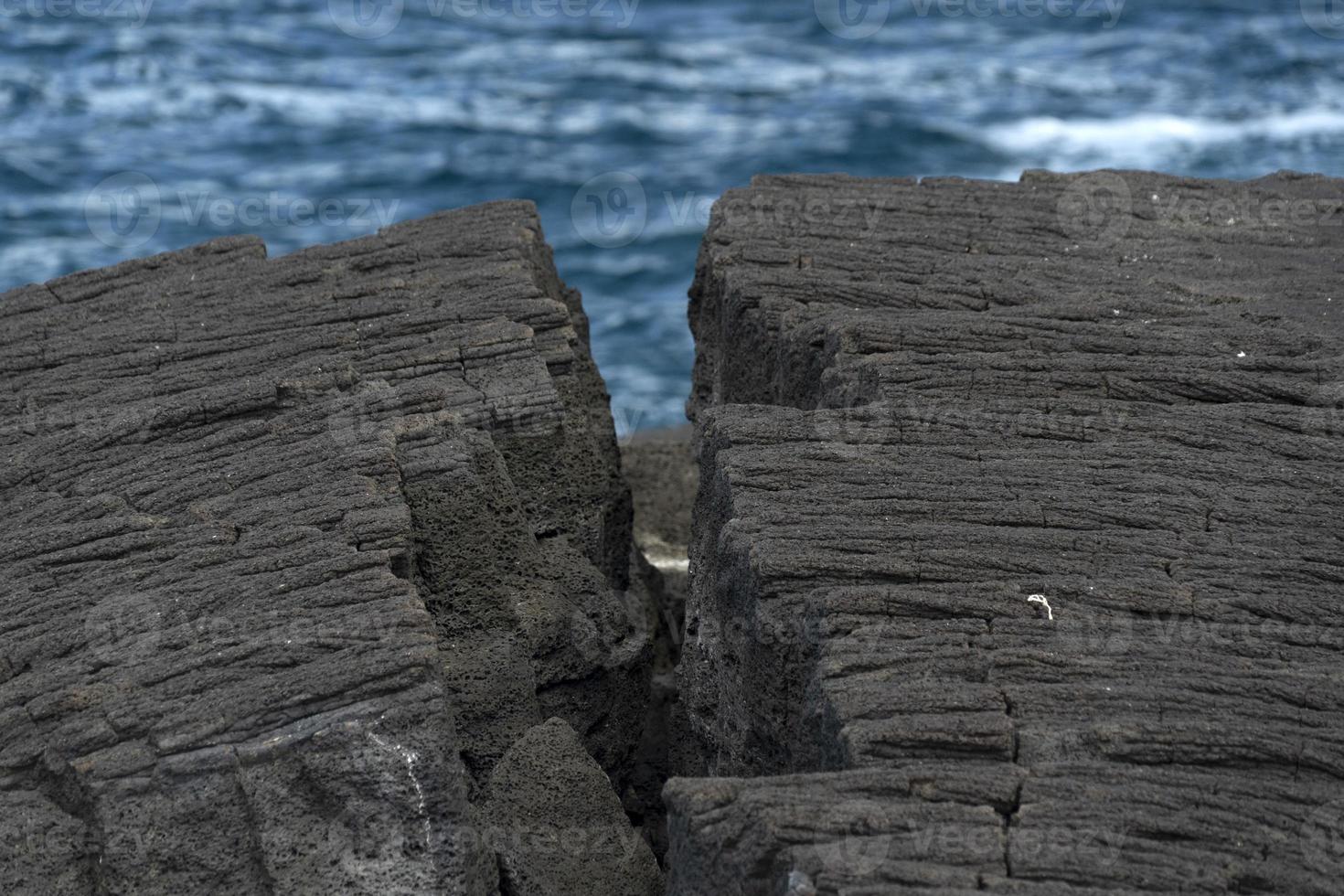 pico azores lava field by the sea detail photo