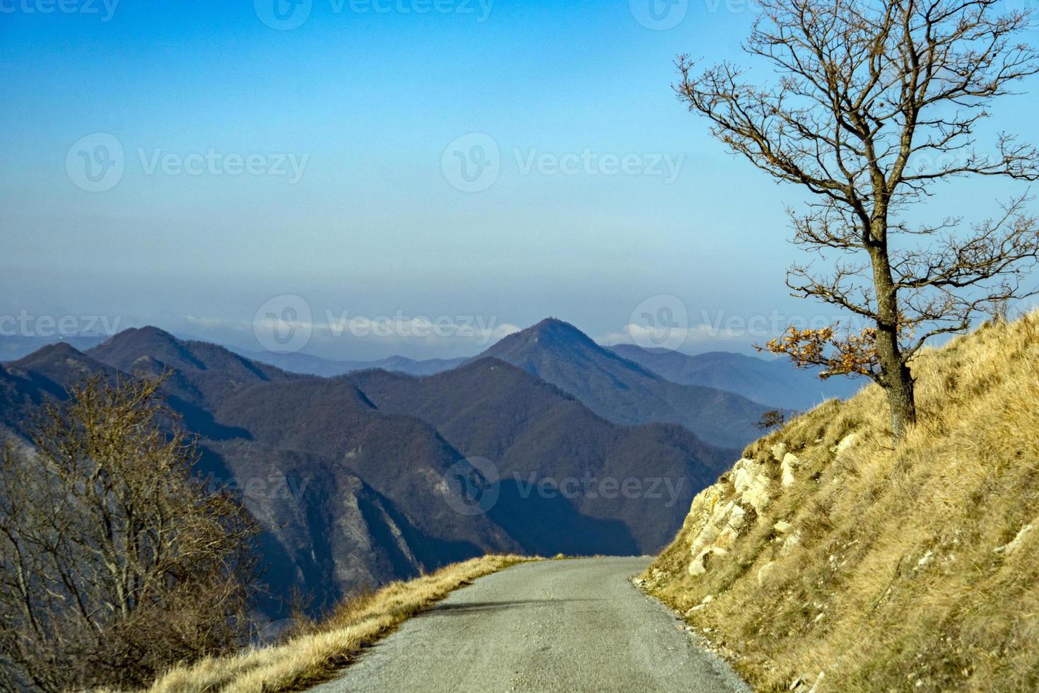 Mountain road  in Antola Park landscape in winter photo