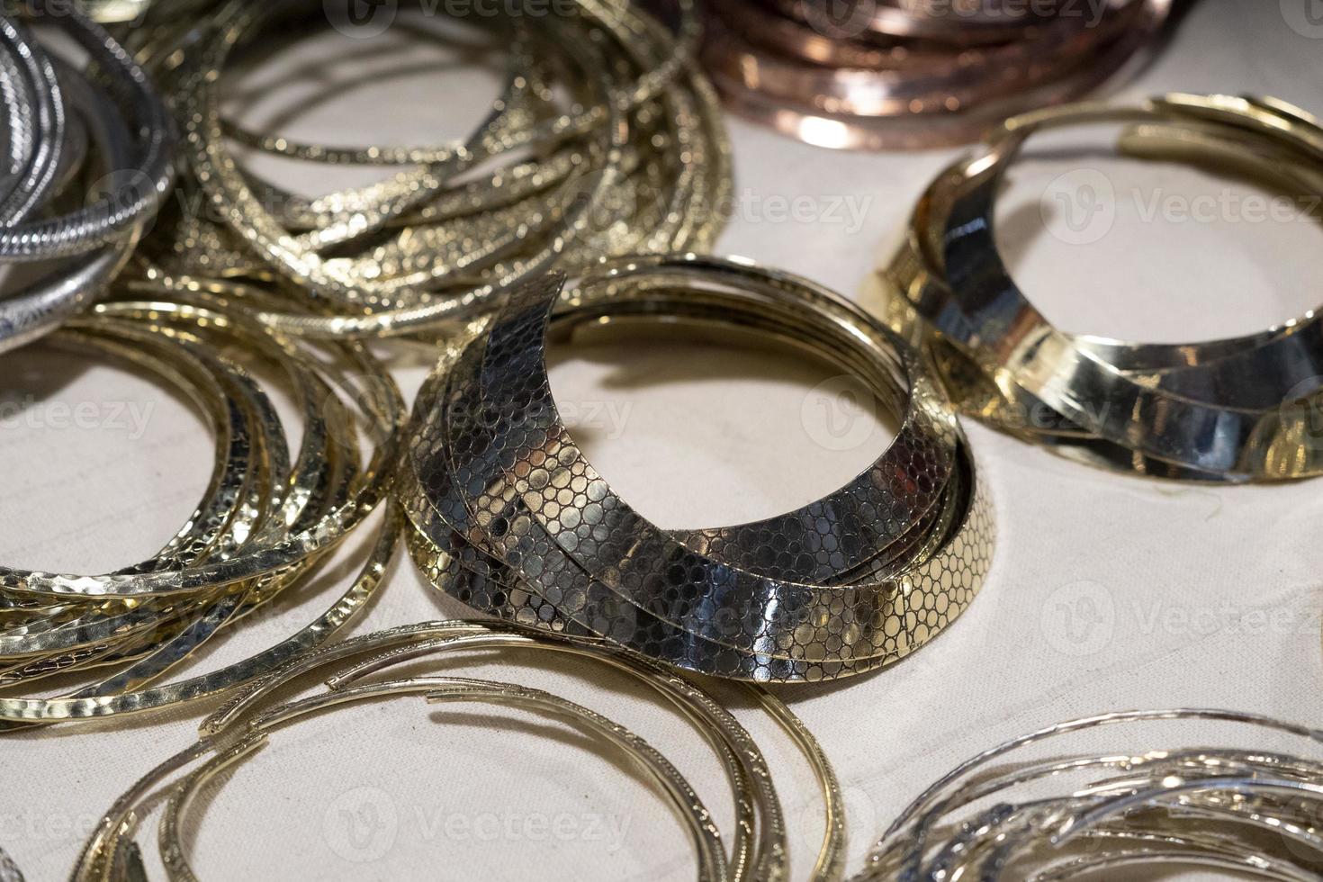 flexible gold metallic bracelet necklage photo