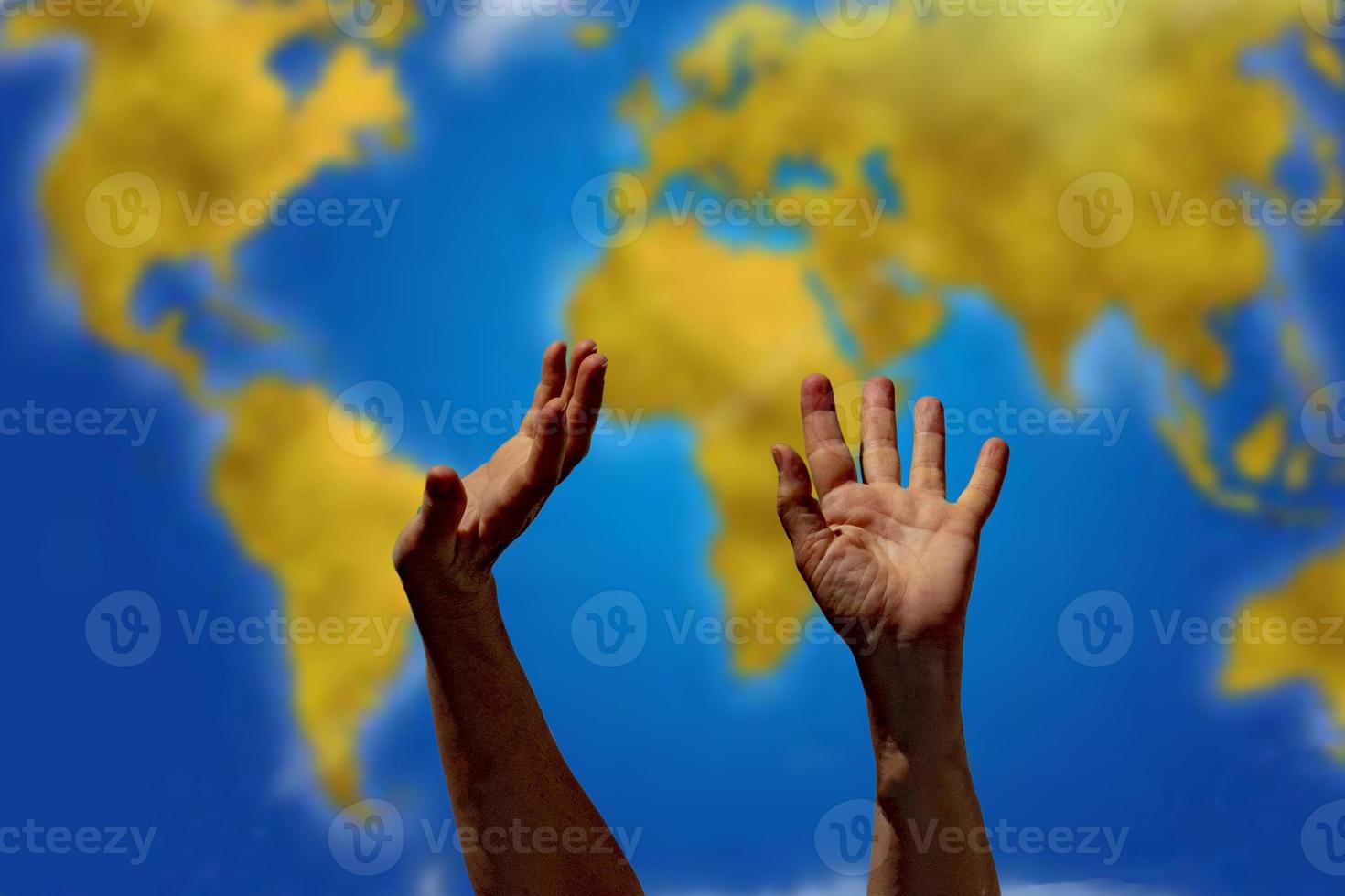 hands of black Migrant detail on boat asking for help from the sea background photo