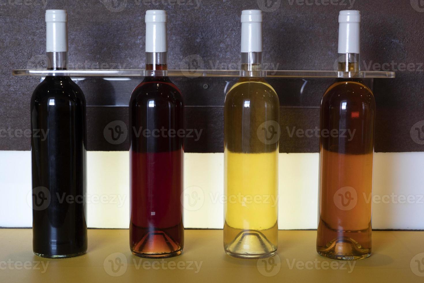 Different bottles of Azores wine red, rose, orange, white photo