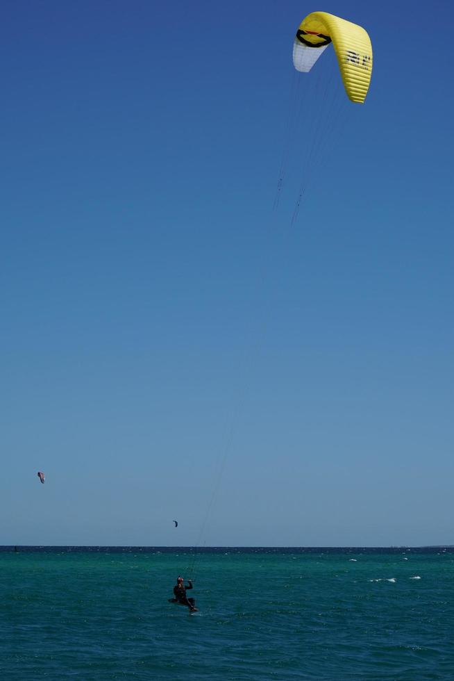 LA VENTANA, MEXICO - FEBRUARY 16 2020 - kite surfering on the windy beach photo