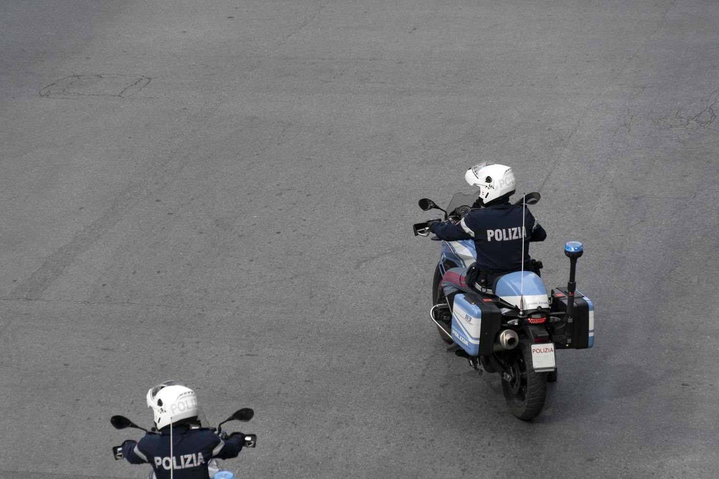 GENOA, ITALY - APRIL 13 2020 - Police control during coronavirus covid quarentine photo