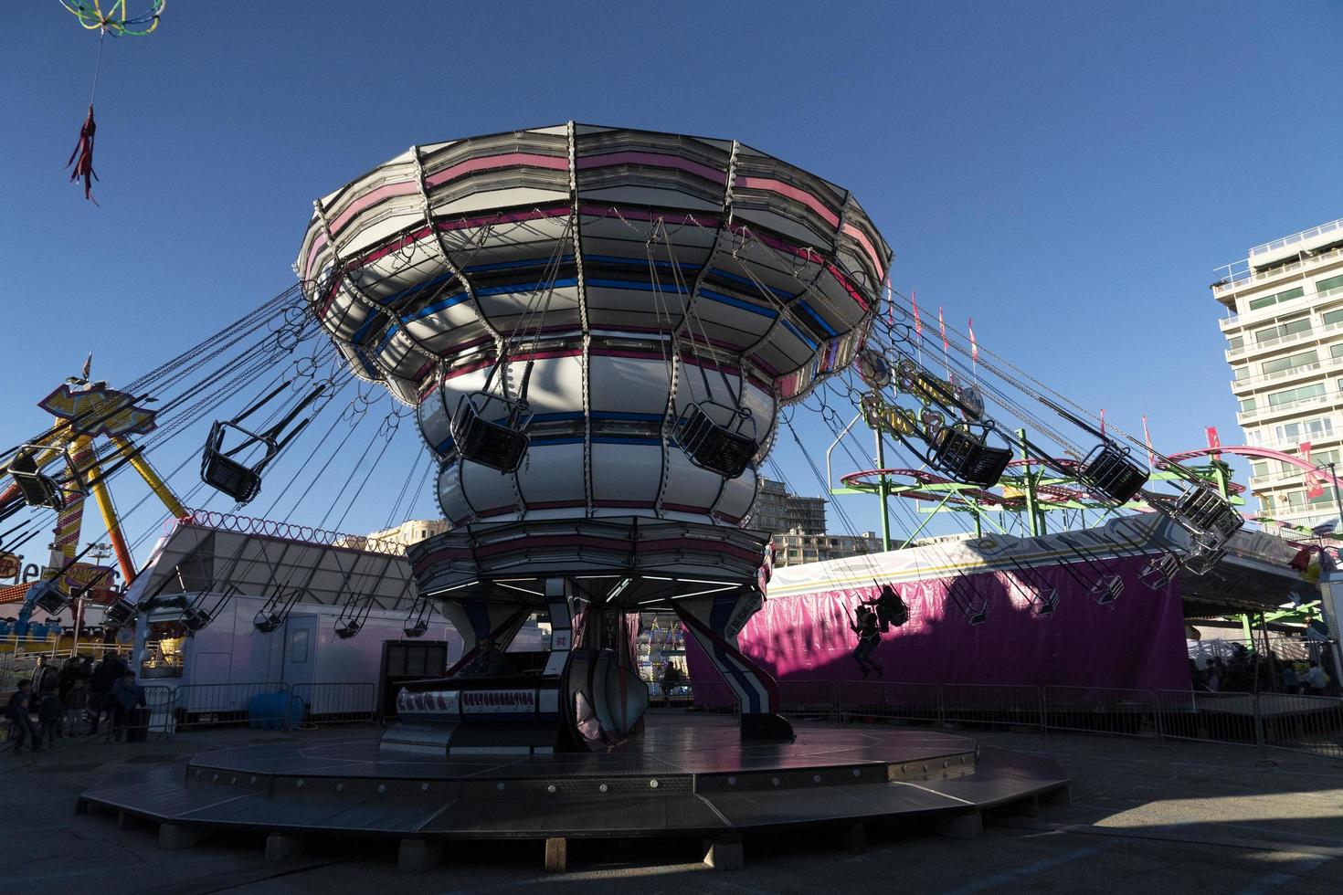 GENOA, ITALY - DECEMBER, 9 2018 - Traditional Christmas Luna Park Fun Fair is opened photo