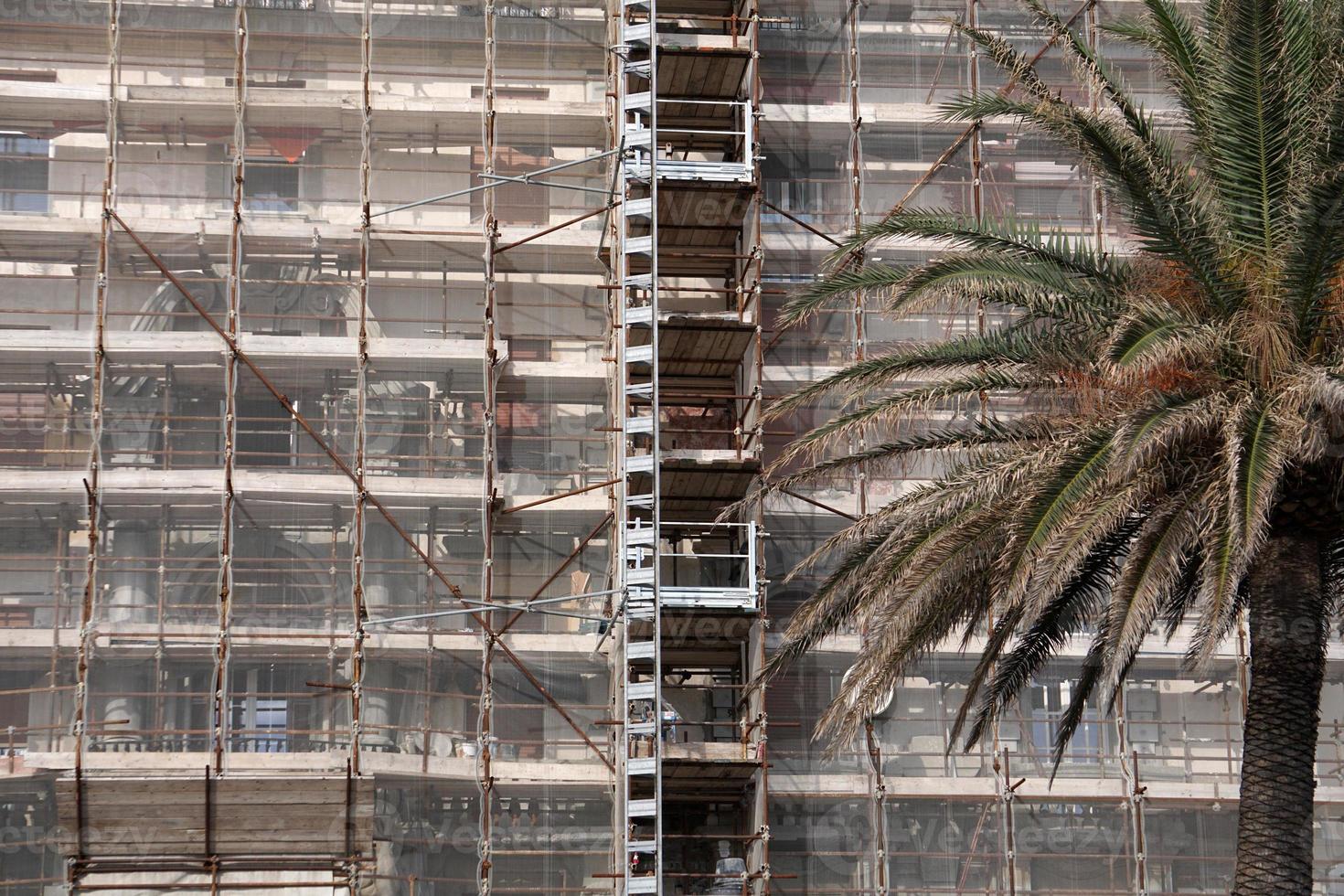 scaffolding on building restoration in Italy photo