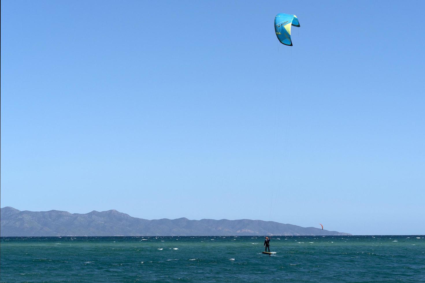 LA VENTANA, MEXICO - FEBRUARY 16 2020 - kite surfering on the windy beach photo