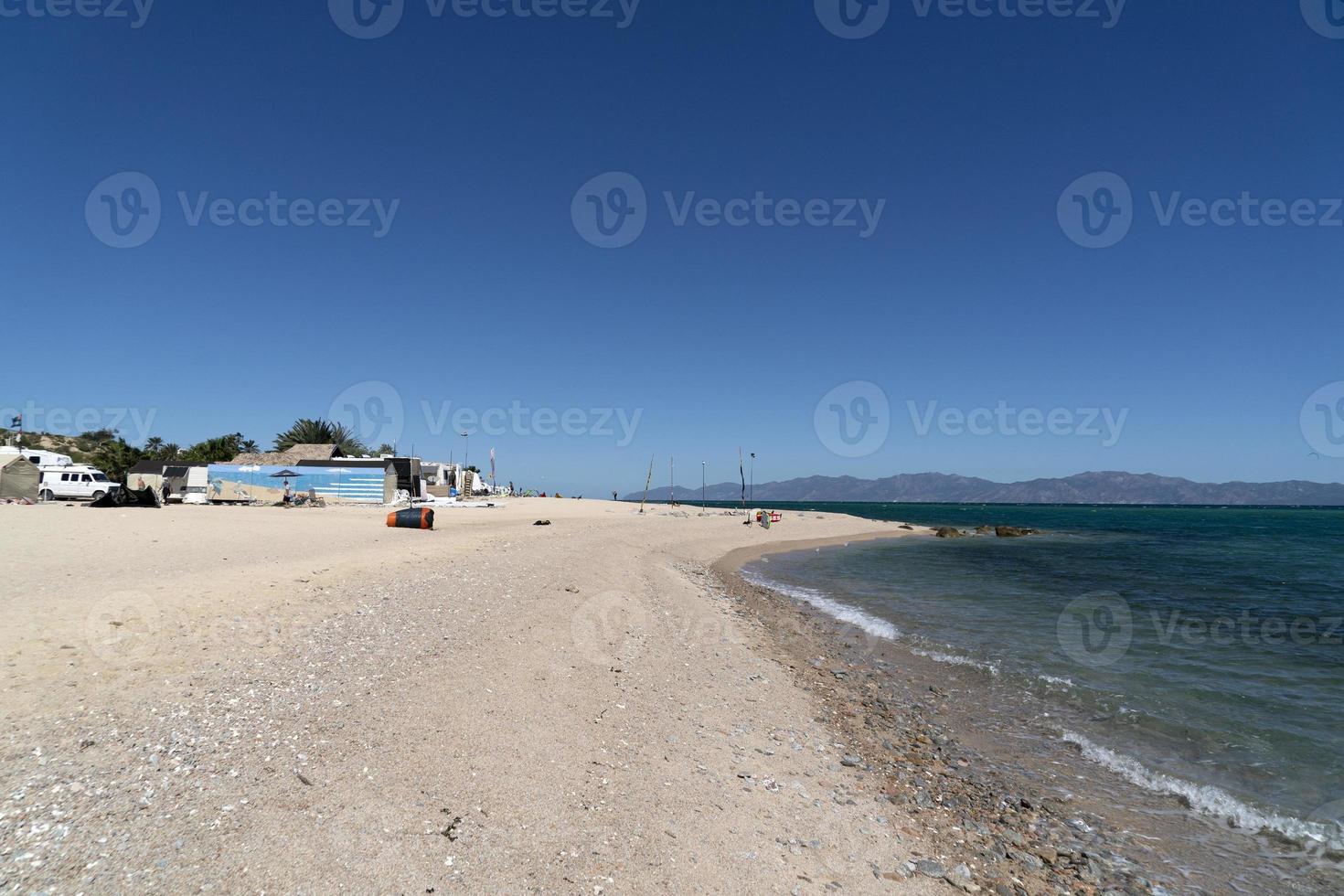 LA VENTANA, MEXICO - FEBRUARY 16 2020 - kite surfering on the windy beach photo