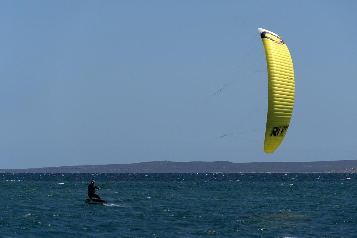 LA VENTANA, MEXICO - FEBRUARY 16 2020 - kite surfering on the windy beach photo