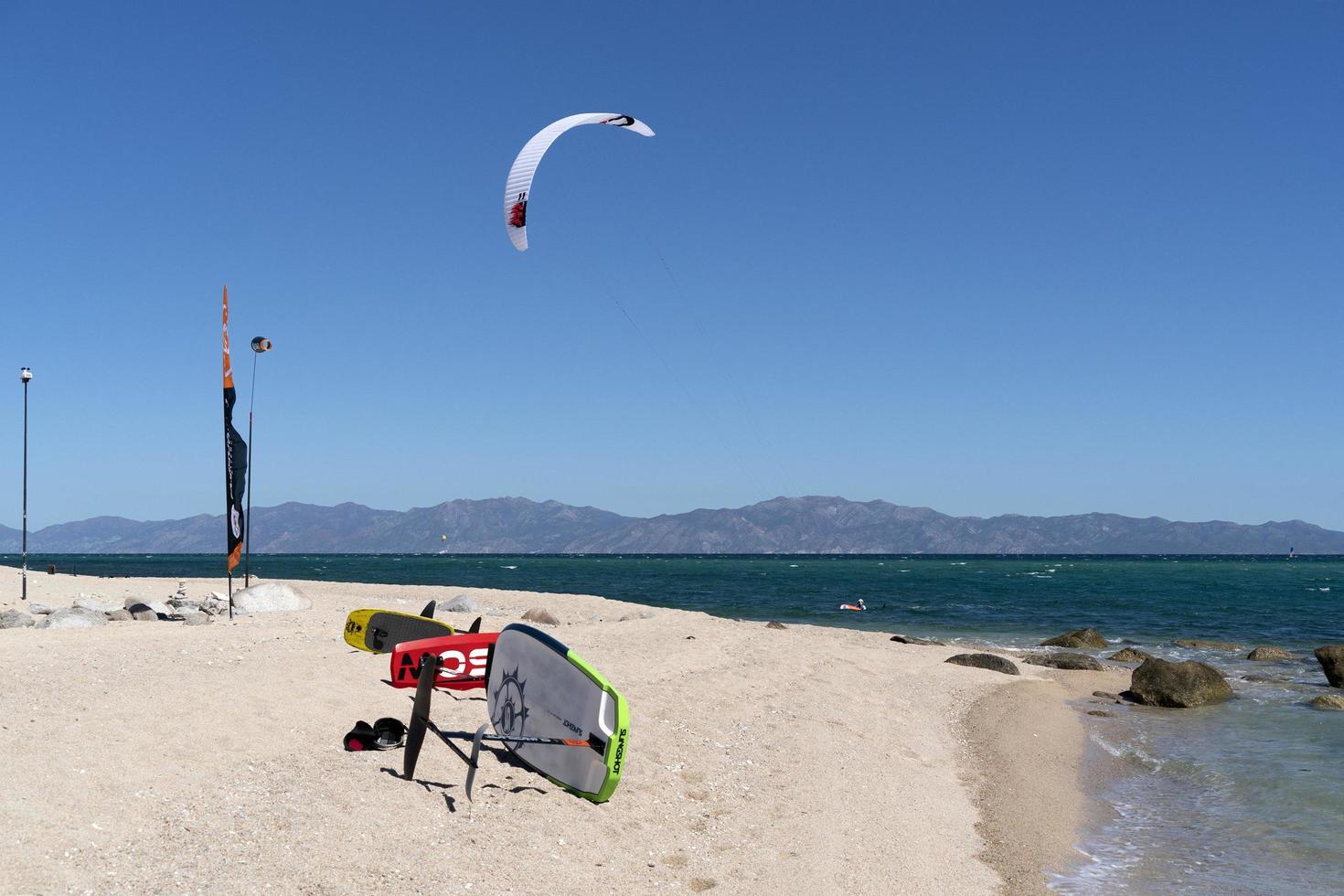 LA VENTANA, MEXICO - FEBRUARY 16 2020 - kite surfering on the windy beach photo