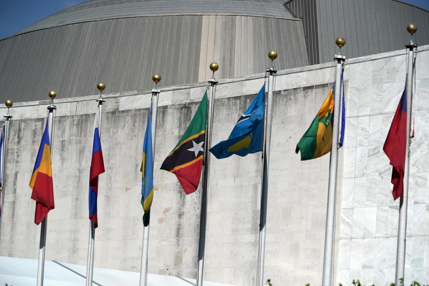 flags outside united nations building in new york, 2022 photo