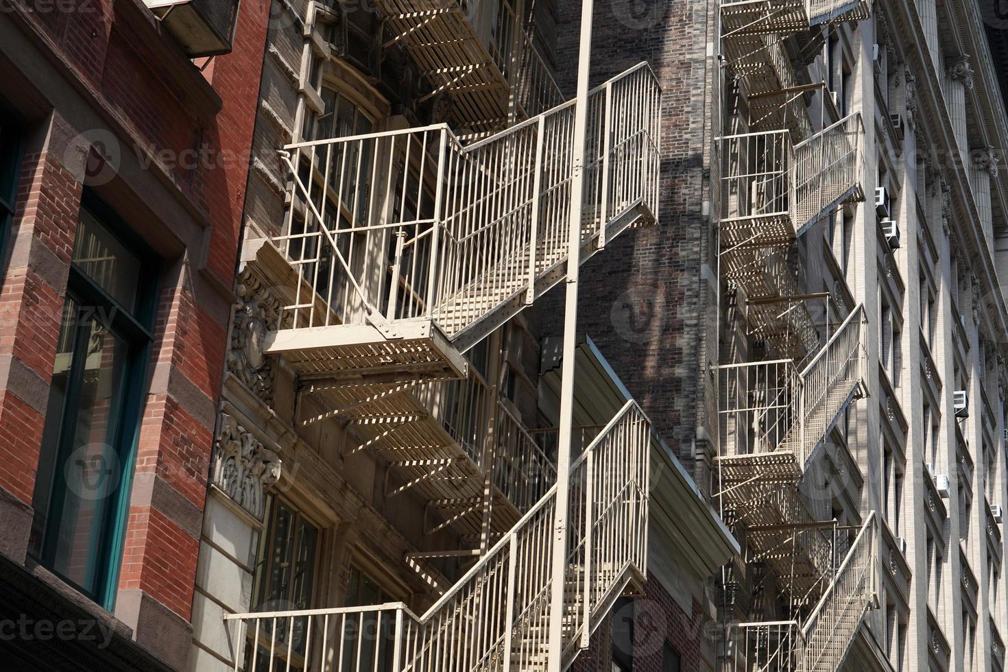 fire escape stairs ladder in new york usa photo