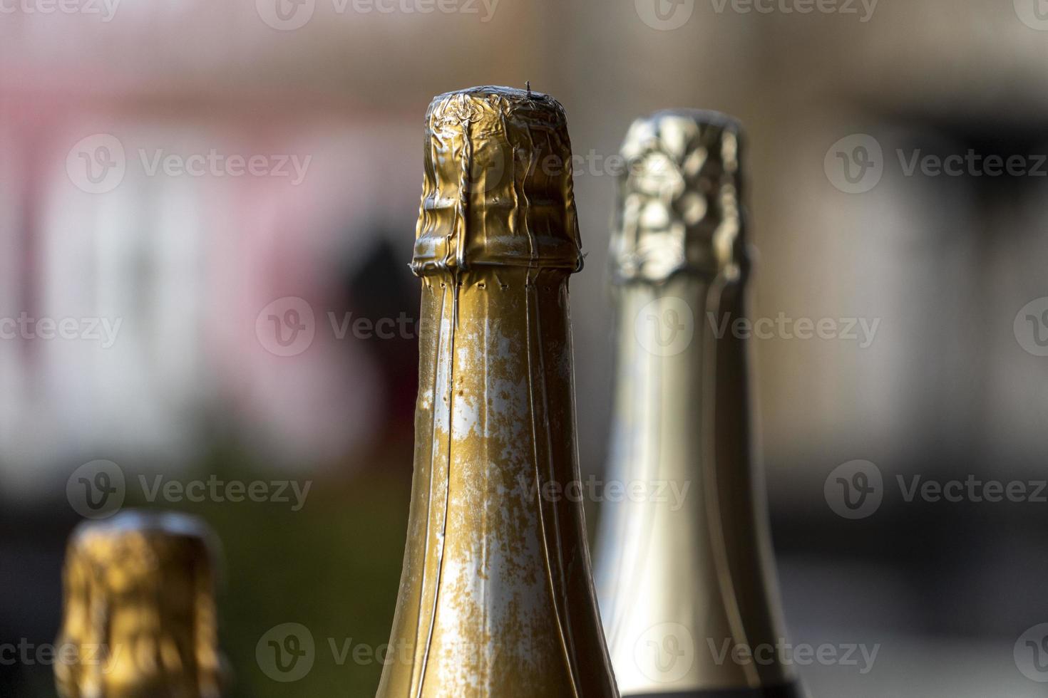 champagne bottles top detail photo