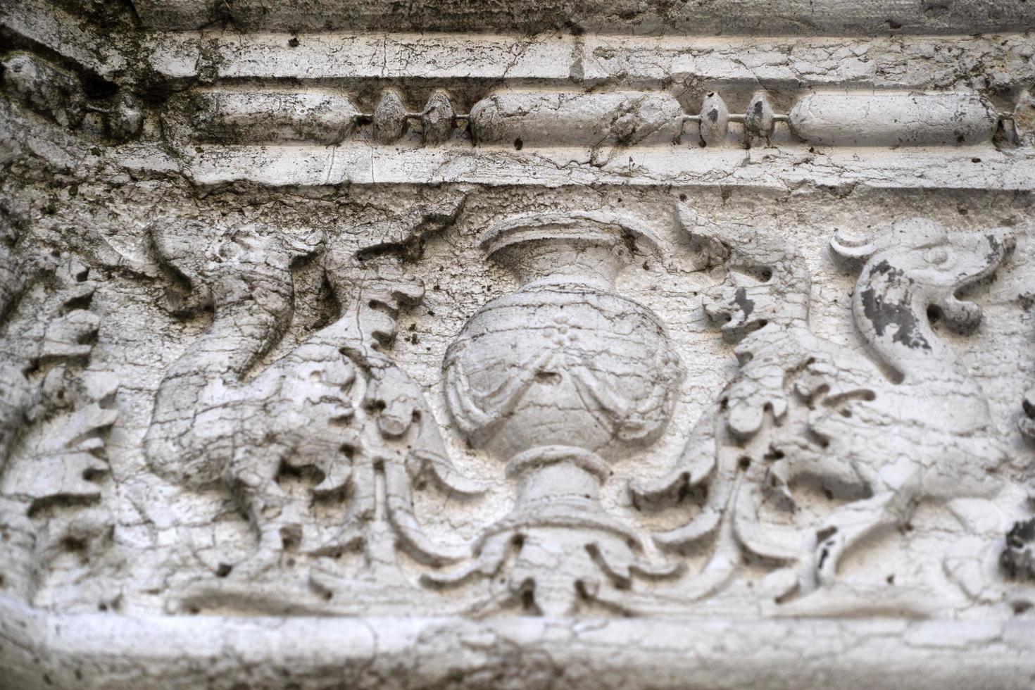 VENICE, ITALY - SEPTEMBER 15 2019 - doge ducal palace capital of column wayside sculpture detail photo