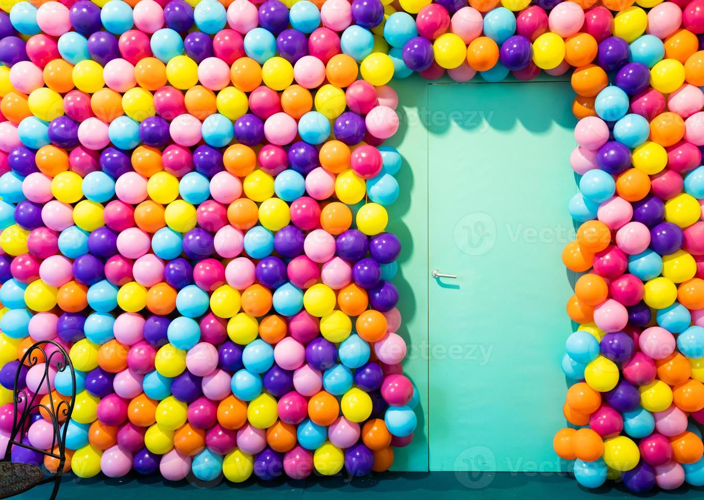 Door room with colorful balloons - concept of celebration, party, happy birthday. photo