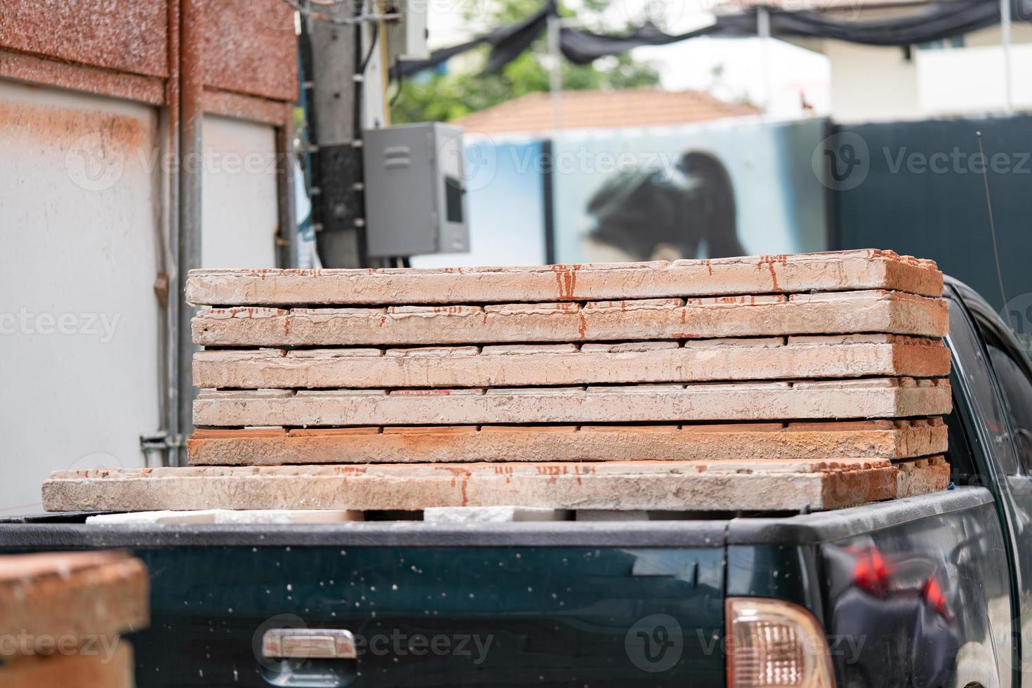 Brick foam board pile on the pick up car on construction site. photo