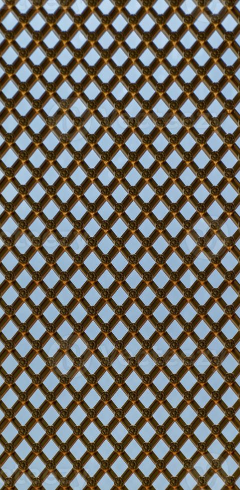 luxury Asia gold grill background with flower pattern in the cross line photo