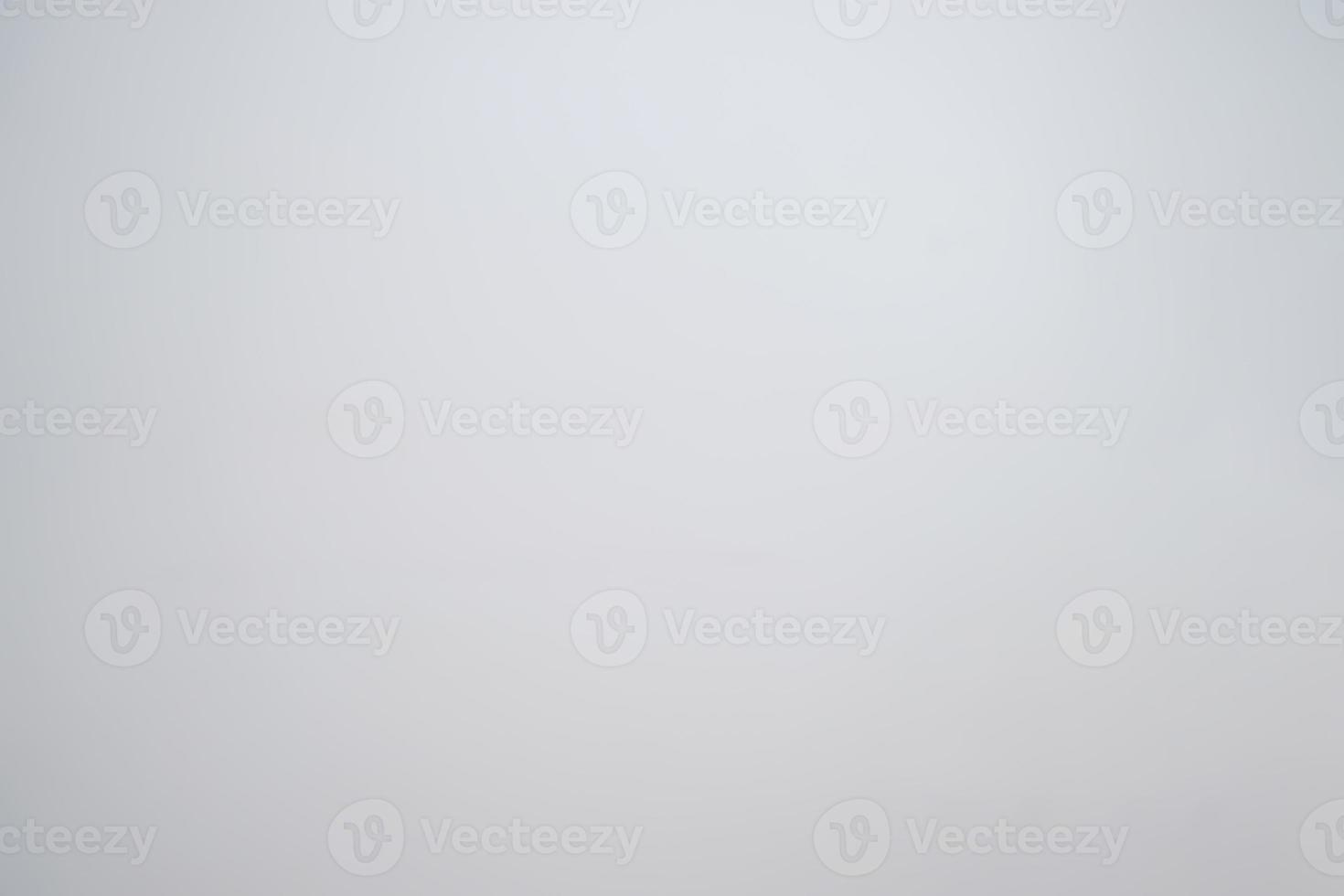 A little mottled bright white wall plain and solid for minimal object background. photo