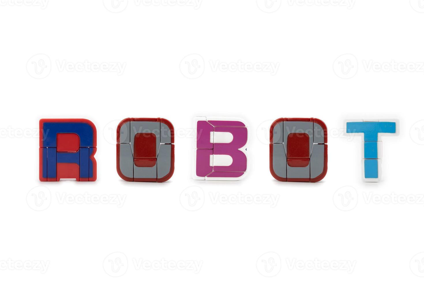 R Alphabet vCapital Letters model figure in ROBOT spelling, stand on white background.intage toy, the robotic transformation model is stood and isolated in studio light. photo