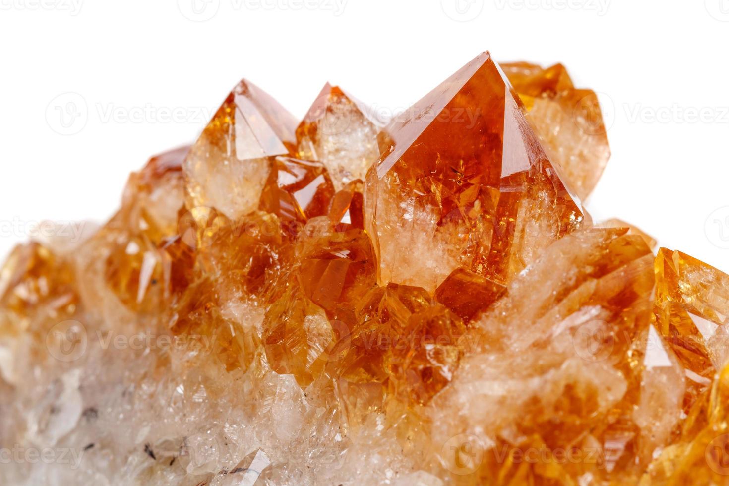Macro mineral stone Citrine in rock in crystals on a white background photo