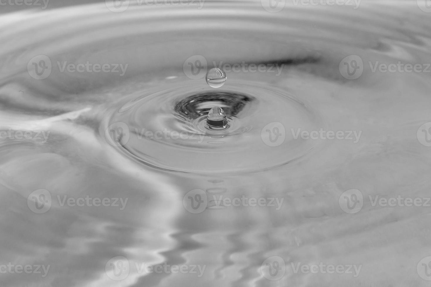 falling drops in water photo