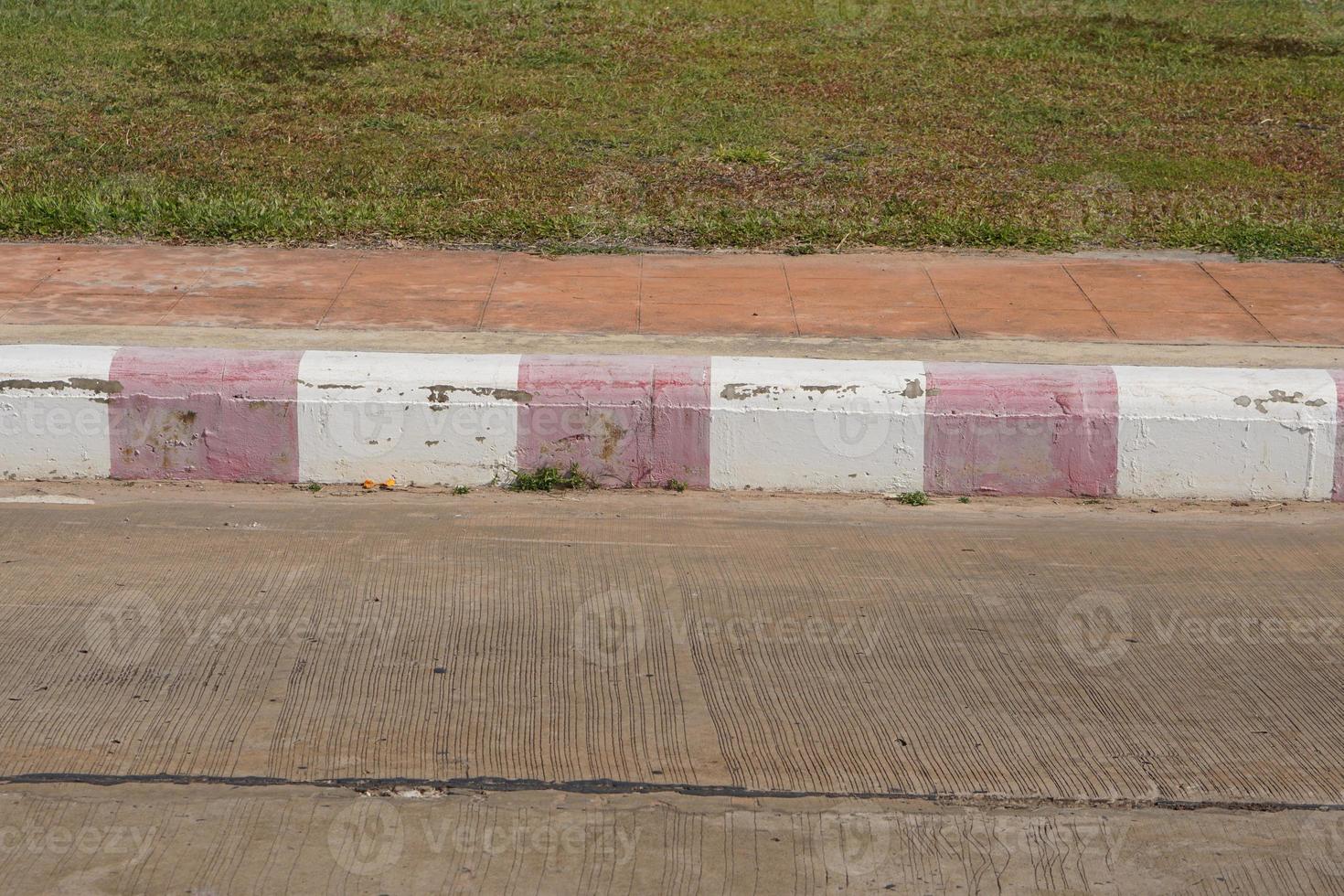 The red traffic line crossing prohibits parking in this area. photo