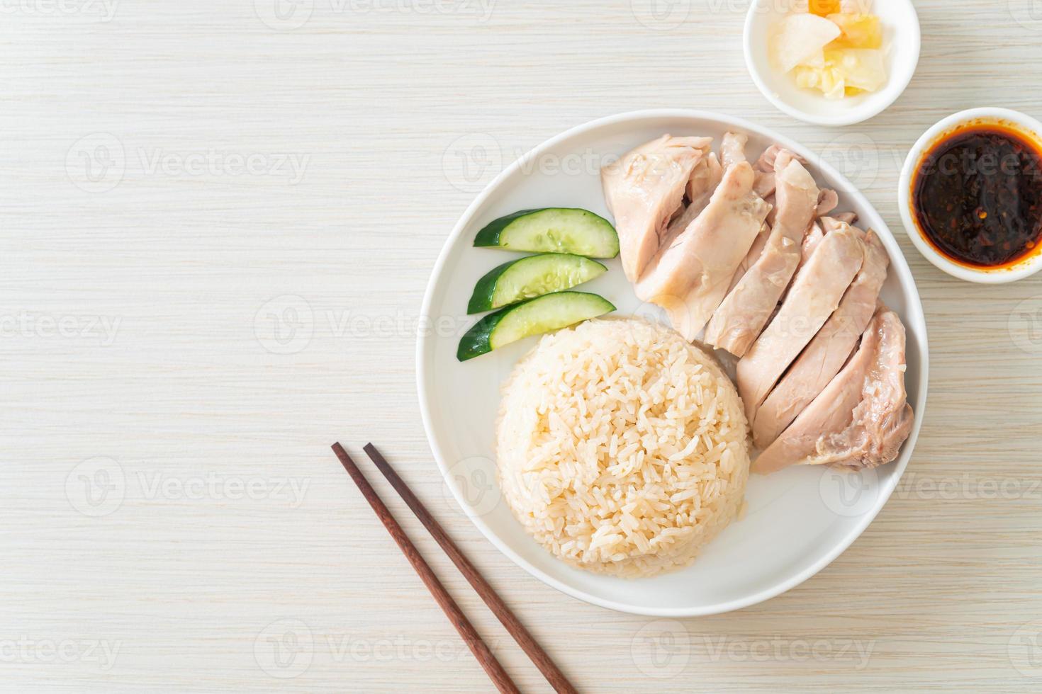 Hainanese chicken rice or rice steamed with chicken soup photo