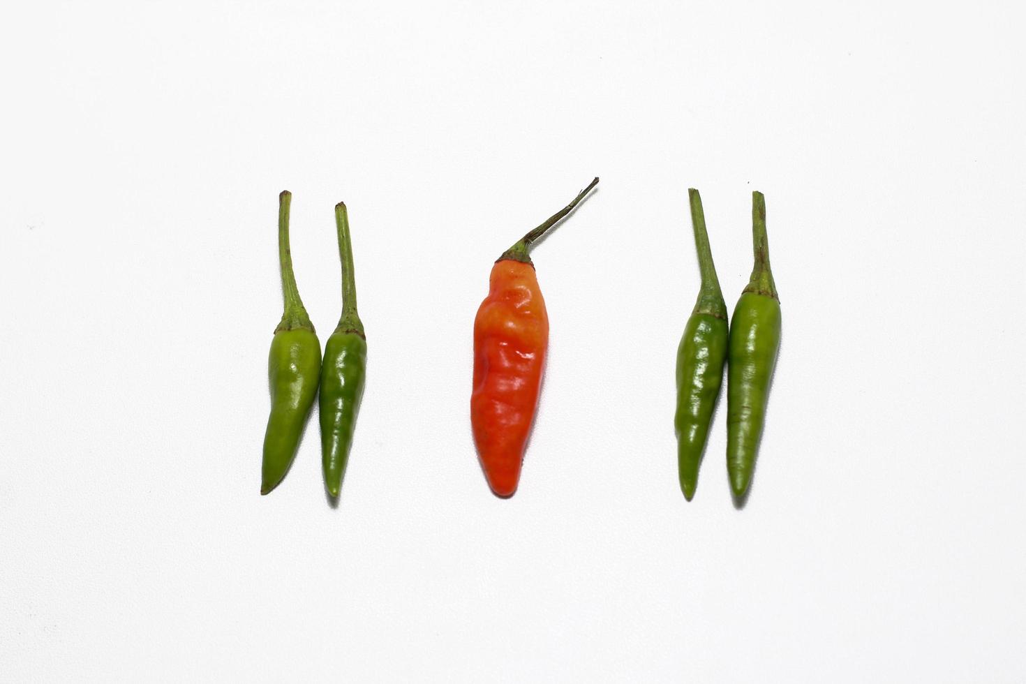 Red and Green hot Cayenne pepper Minimal food concept photo
