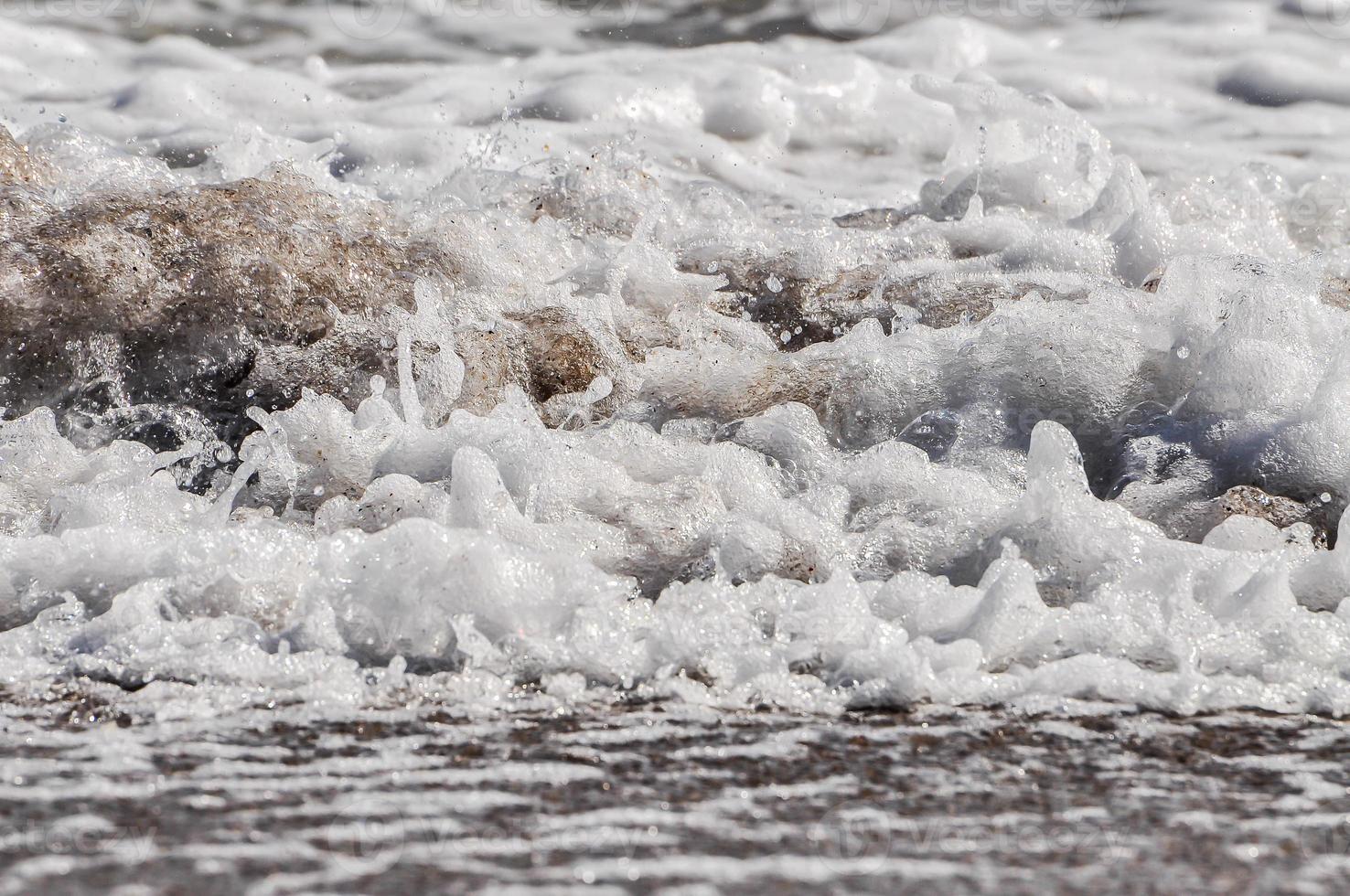 sea foam. splash water photo