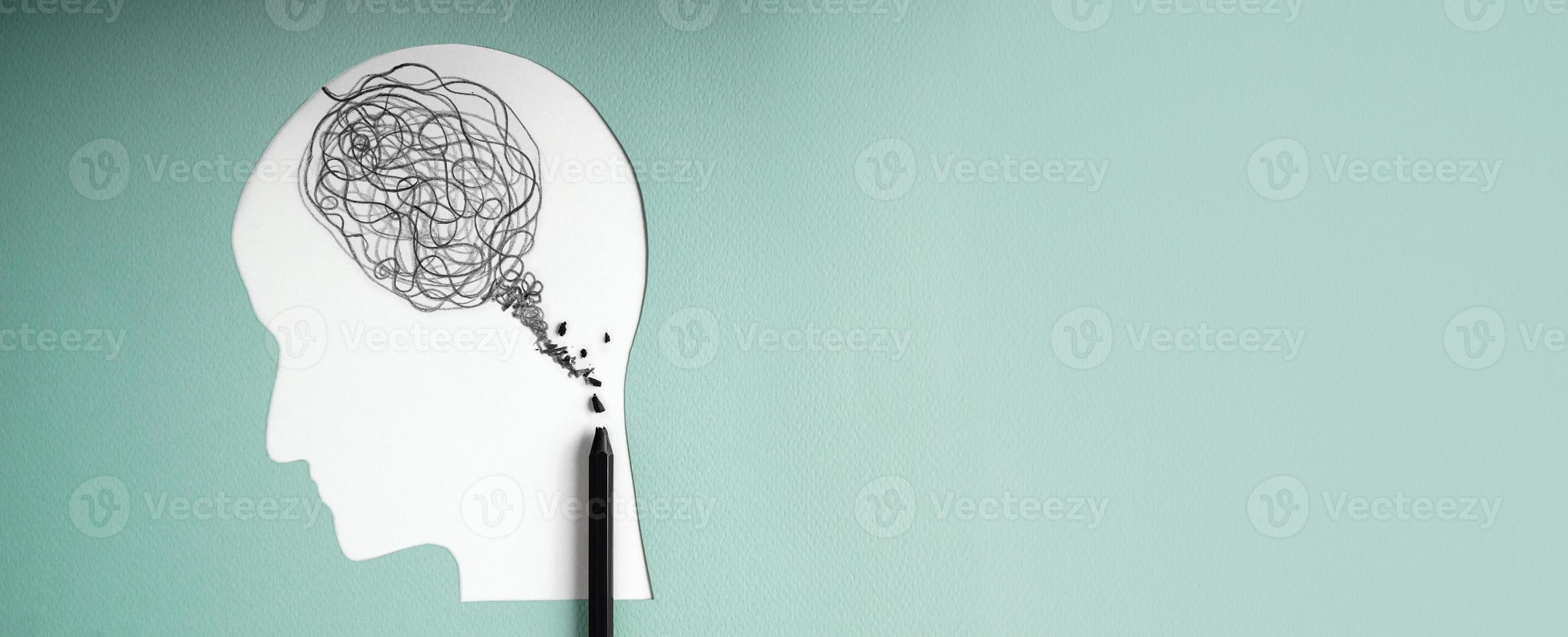 Mental Health Disorder Concept. Weak, Stressed Down Person. Negative Feeling. Depressed Emotional inside a Brain and Mind. Messy Draw Line on Brain with Broken Pencil. photo