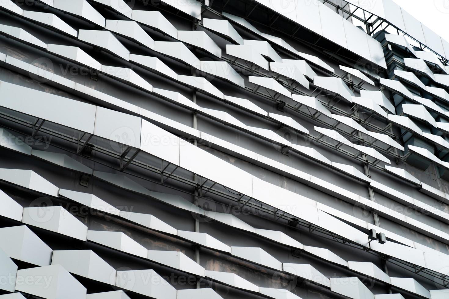 modern Aluminium composite material architecture gray color and Hexagon shape popup texture on exterior facade building. photo