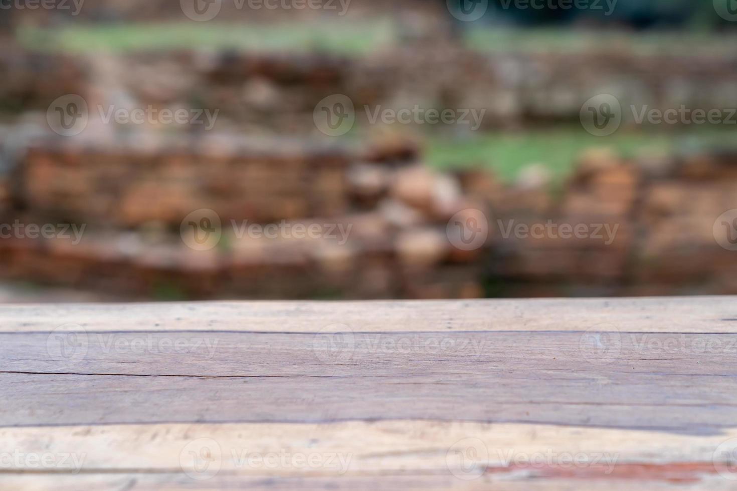 Wood logs flat slide surface on blur outdoor background for realistic montage product display. photo